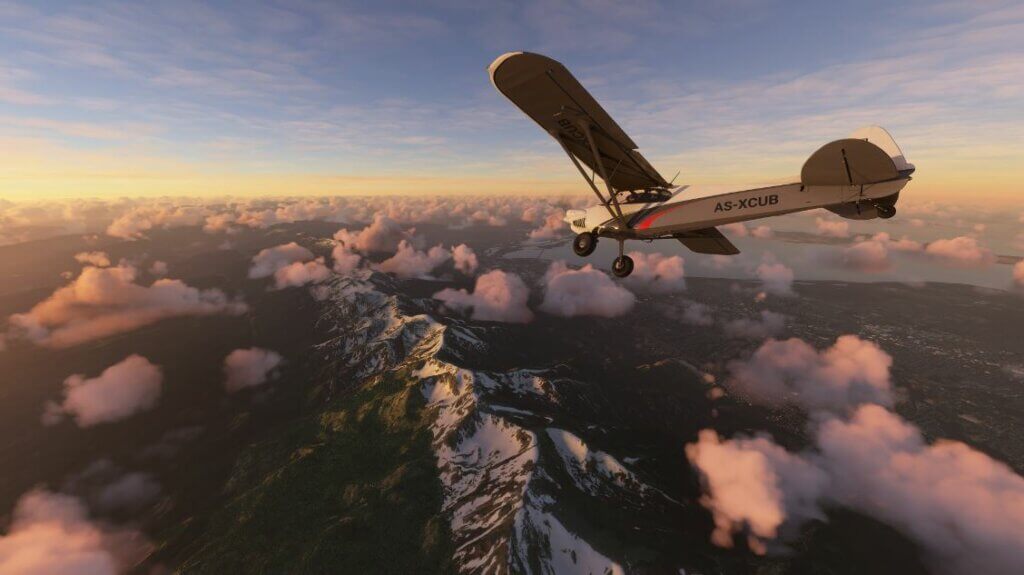 Xcub flying over snow-peaked mountains