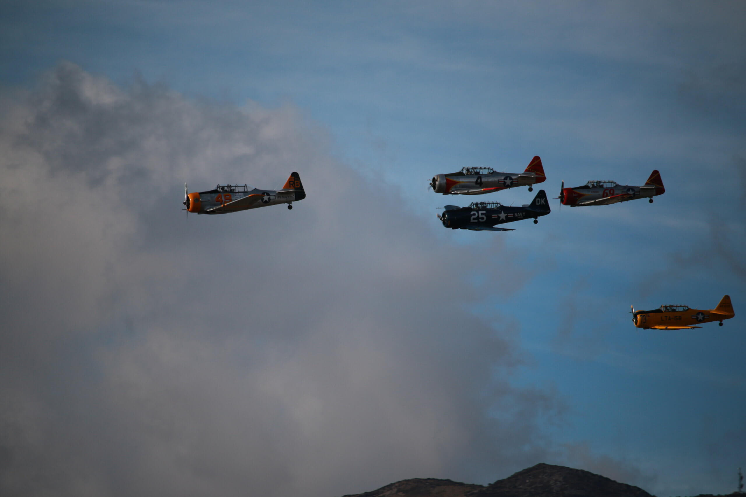 Multiple T-6s competing in a race