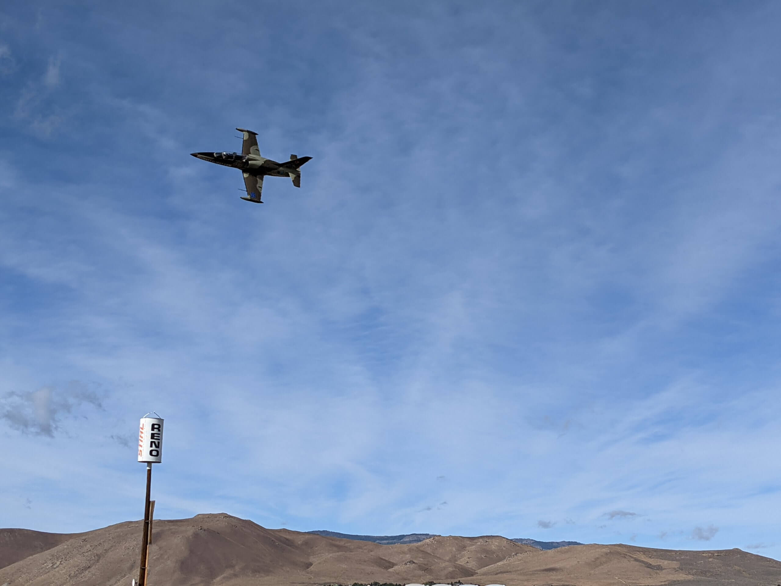 A jet flies past a Reno racing pylon