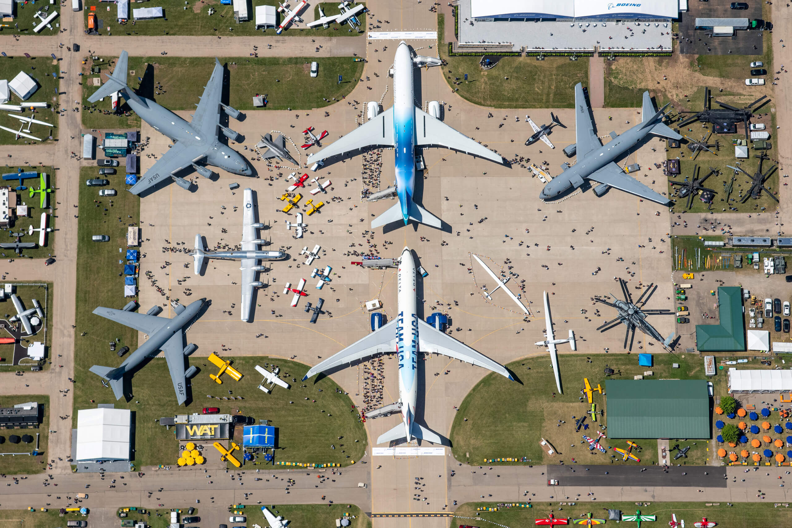 An aerial view of dozens of planes on display at Oshkosh