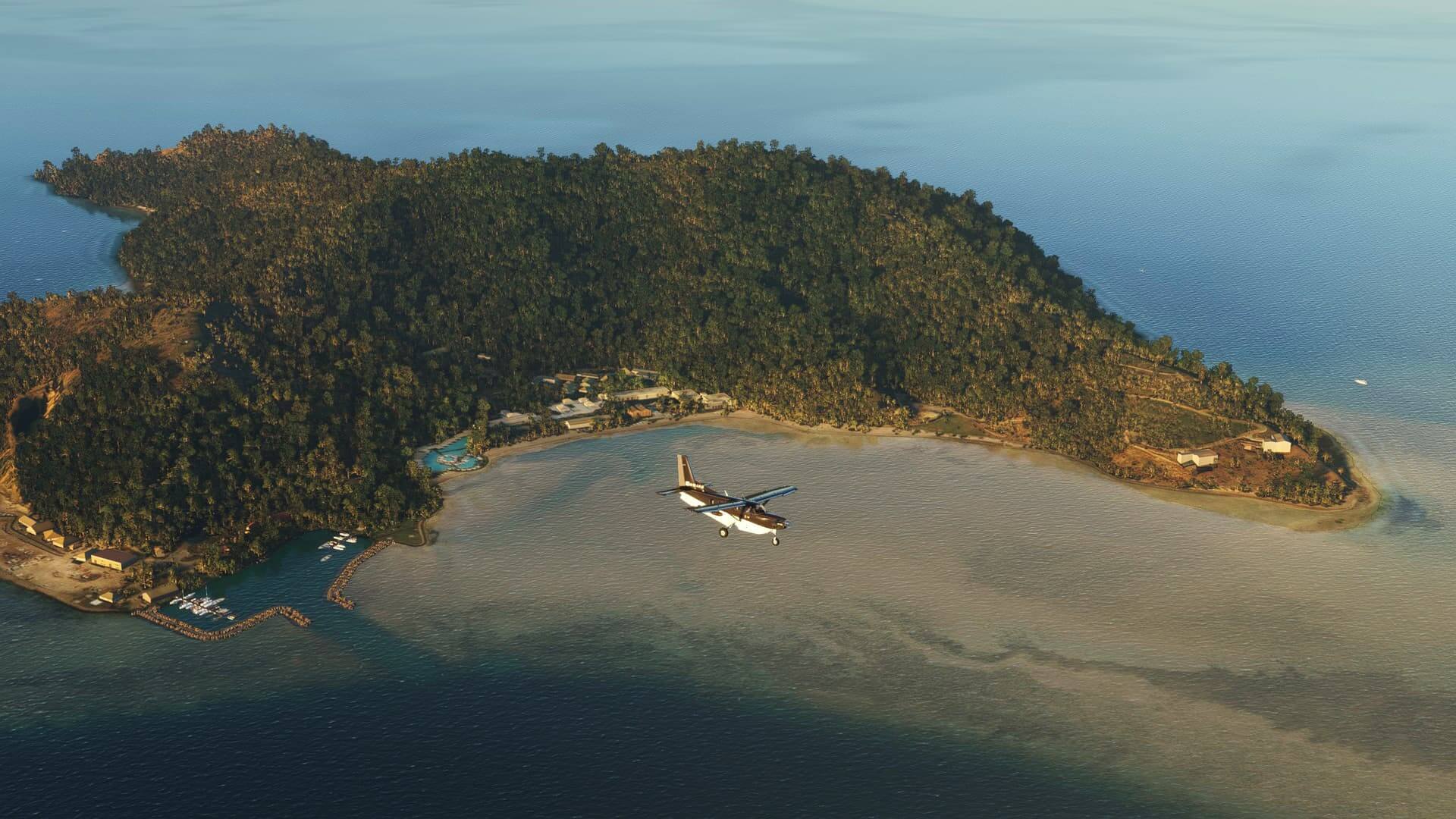 A plane flies over an island.