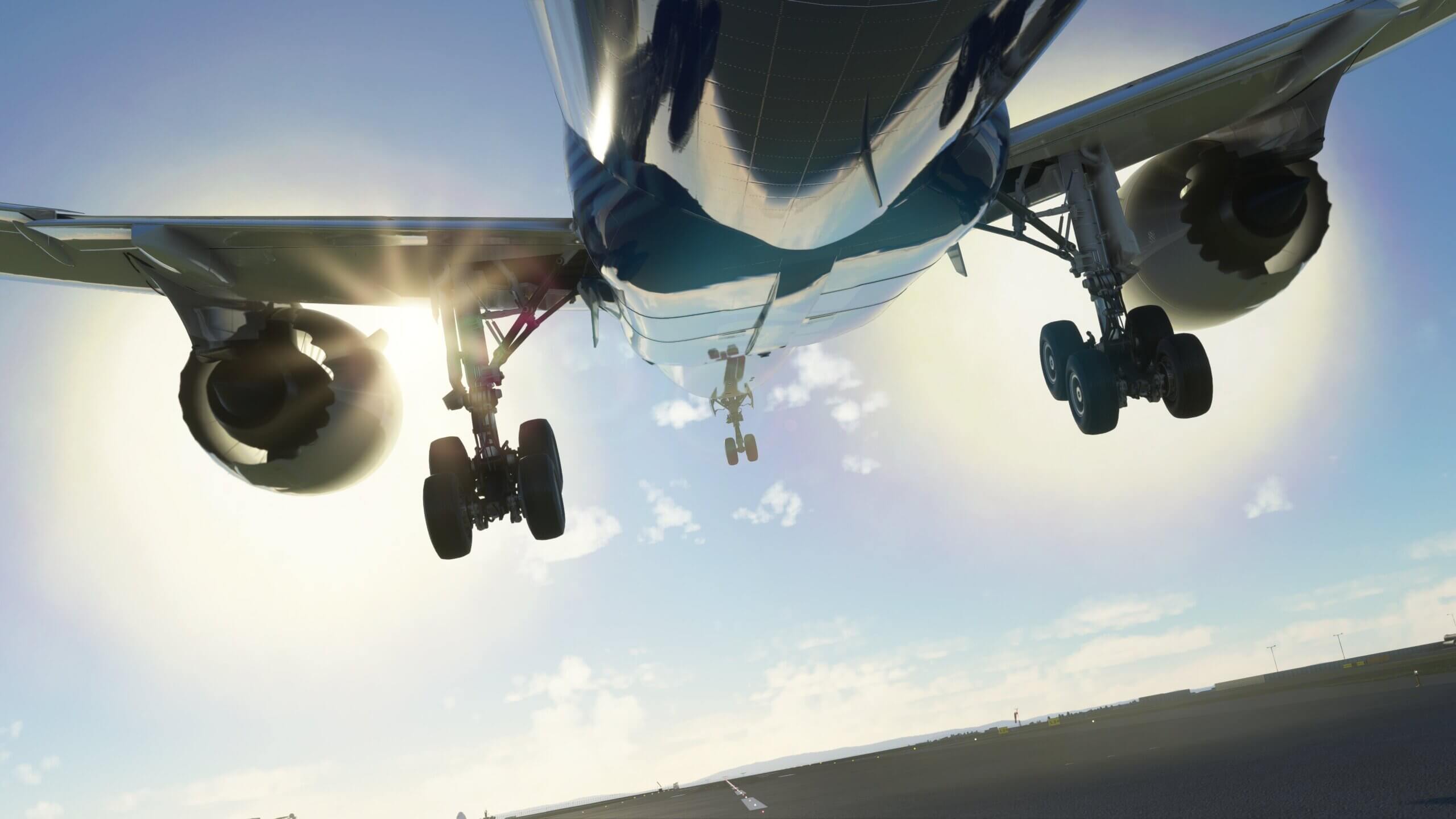 The underside of a large plane during takeoff. 