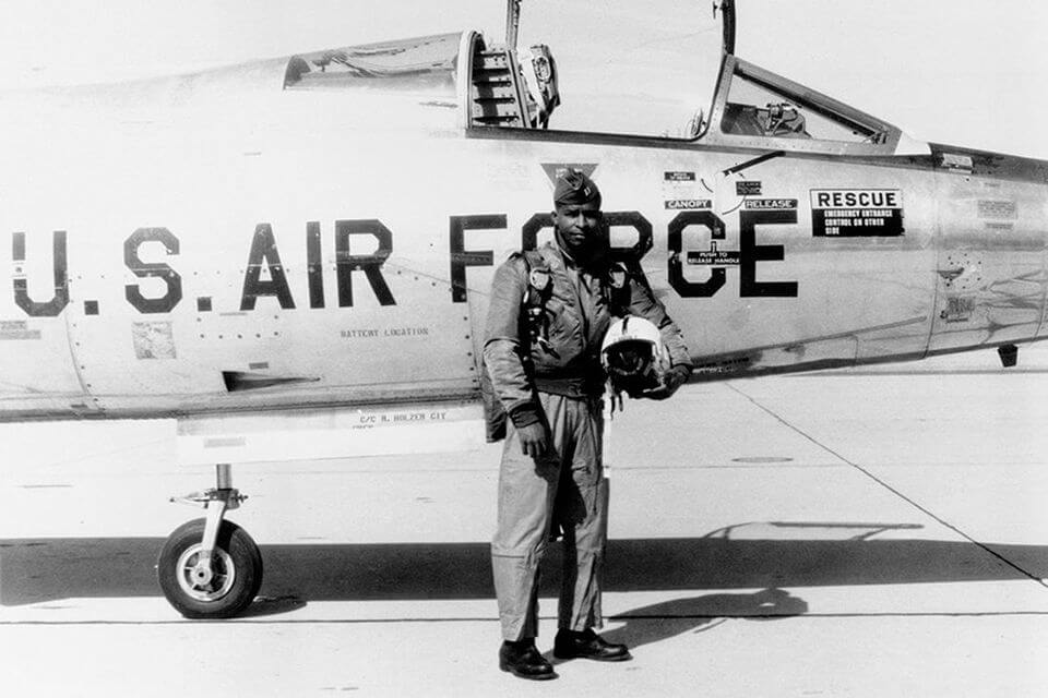 Pilot Robert Lawrence stands in front of a Lockheed F-104 Starfighter