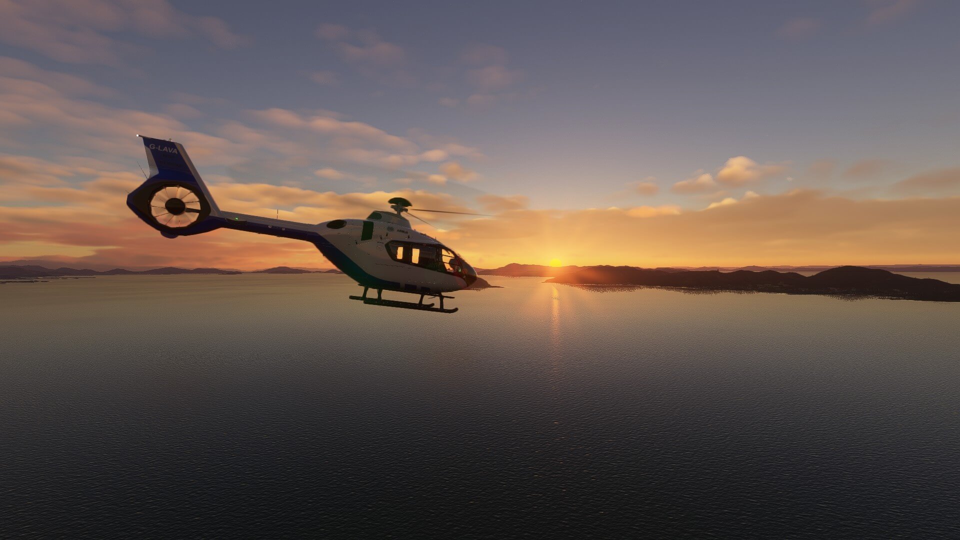 A helicopter flies over a lake as the sun sets in the distance.