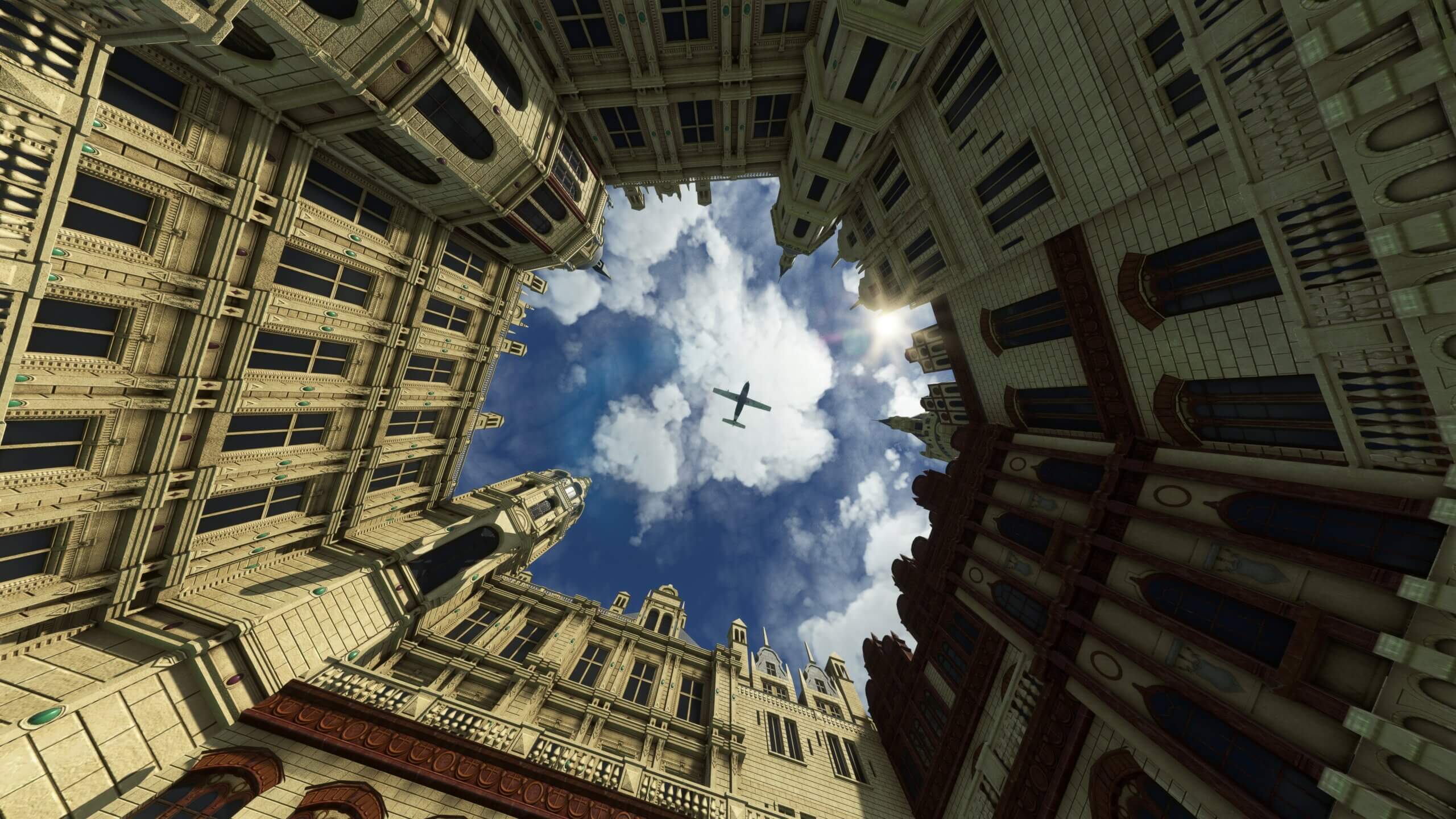 Bottom up view of a plane flying over a building courtyard. The walls of the building are on all sides of the image.