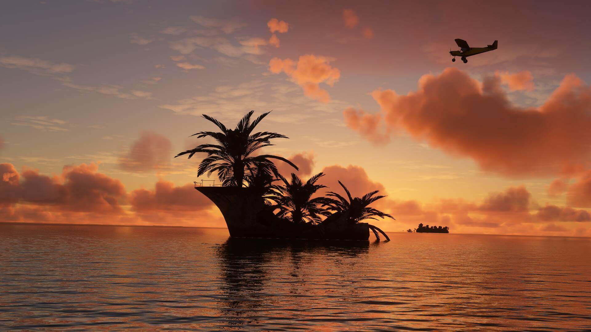 A single engine prop plane flies over a very small island at sunset. The island has several palm trees growing on it.