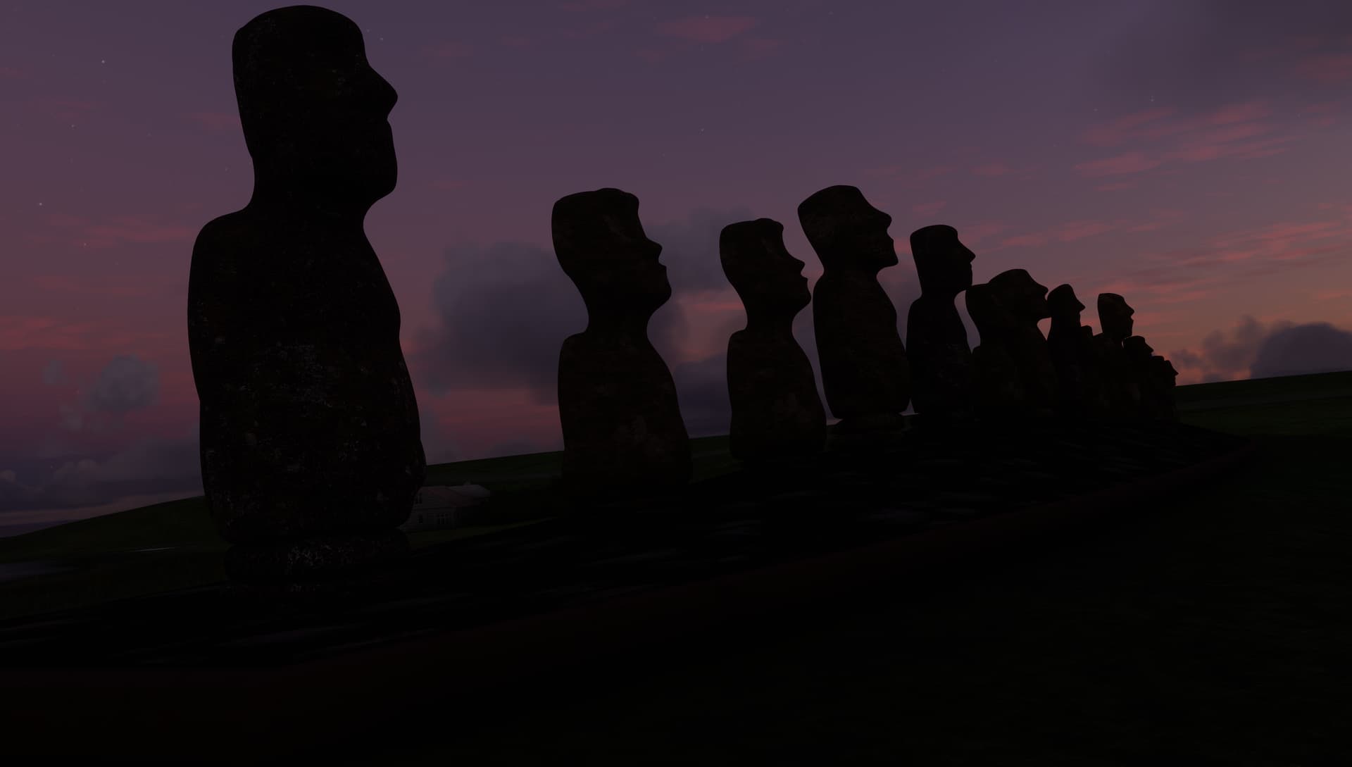 The Moai statues (large rock carvings in the shape of human heads) from Easter Island at dusk. The sky in the background is purple/pink.