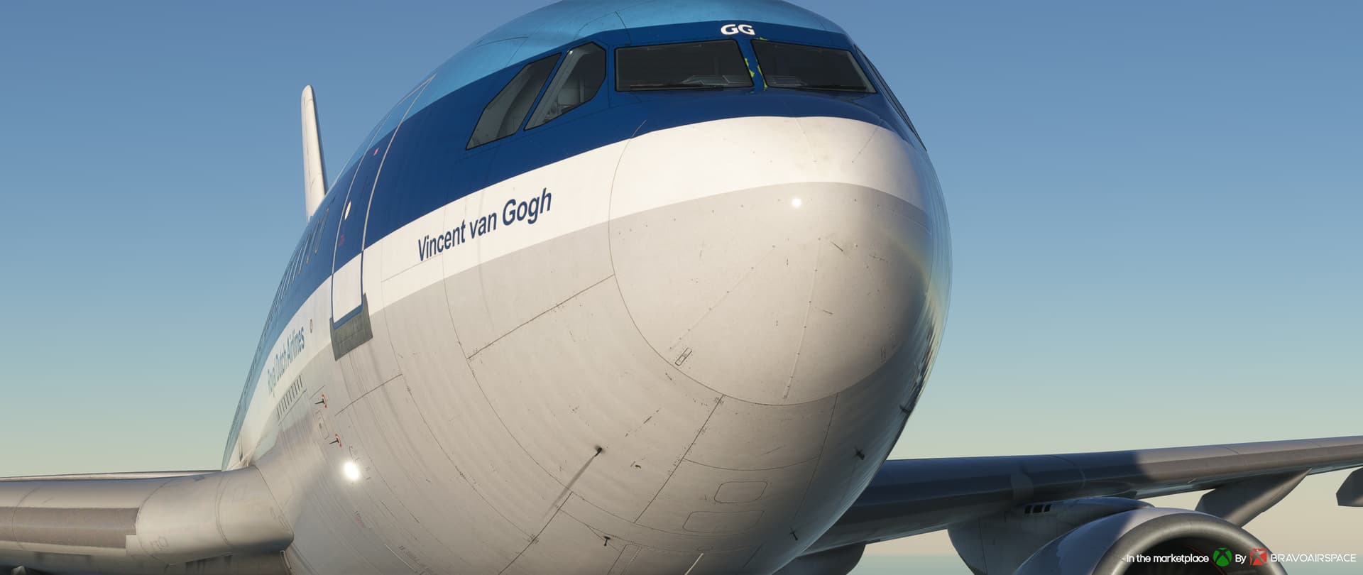 A head on view of an airliner with a white and blue livery. The nose of the plane has the words "Vincent van Gogh" painted on it.