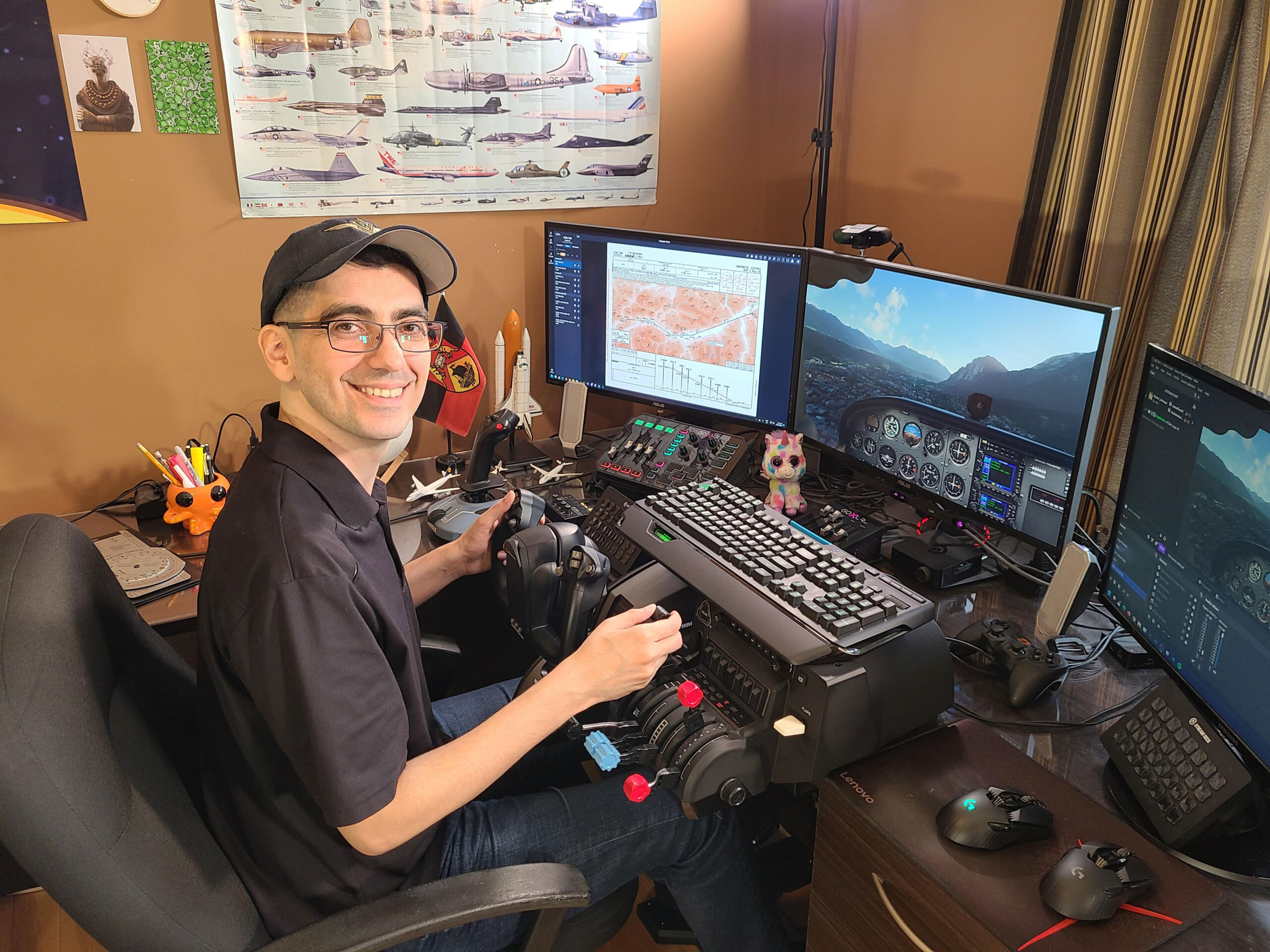 CaptArash sits at his home computer featuring flight sim peripherals from Thrustmaster, Honeycomb, and Tobii.