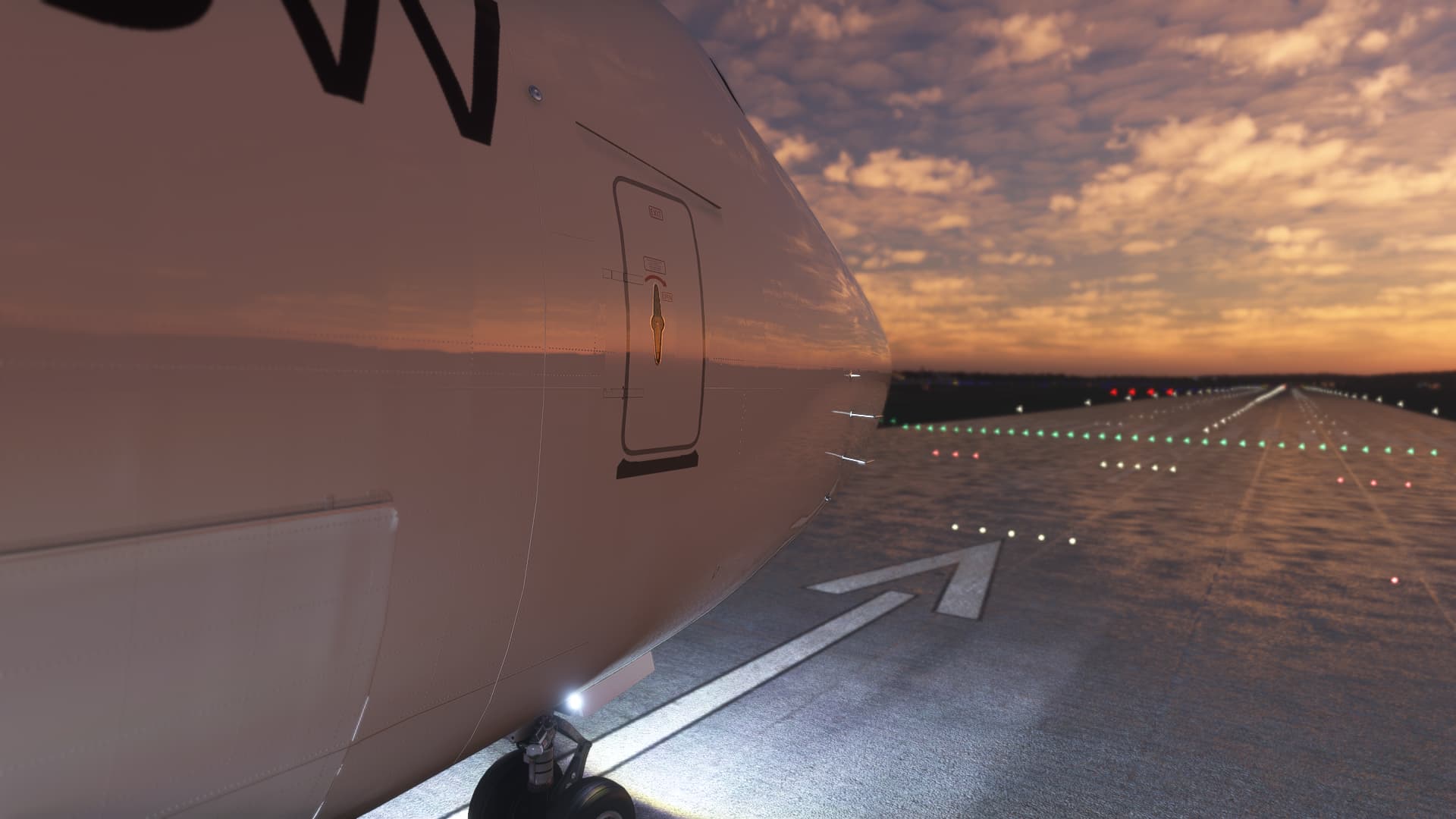 Forward facing view of a jet airliner's nose section. The plane is on a runway about to takeoff.