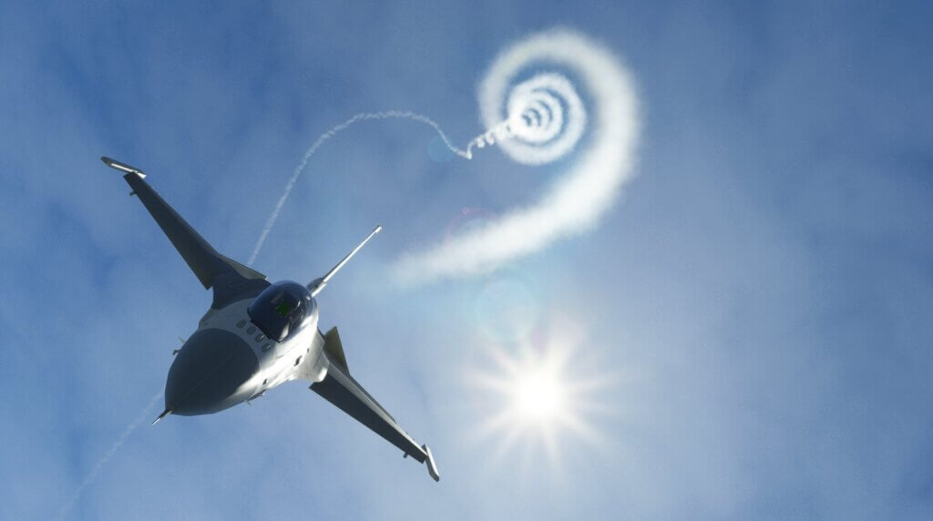 An F-16 spirals its way downwards vertically, with the sun casting shadows on the aircrafts fuselage.