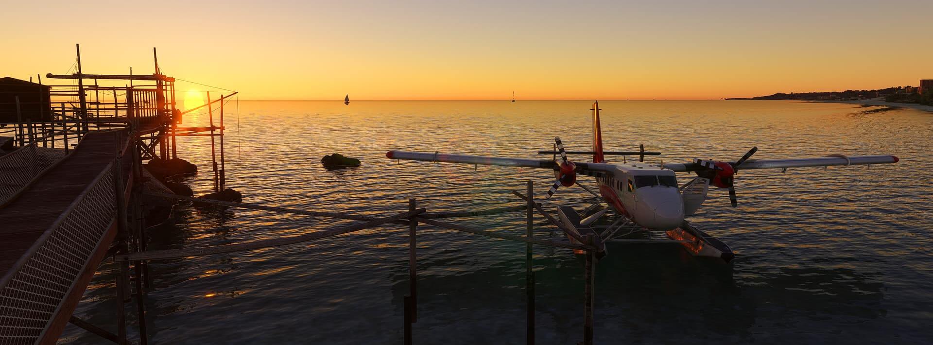 A dual engine seaplane rests on calm waters near the shore, as the sun sets in the distance