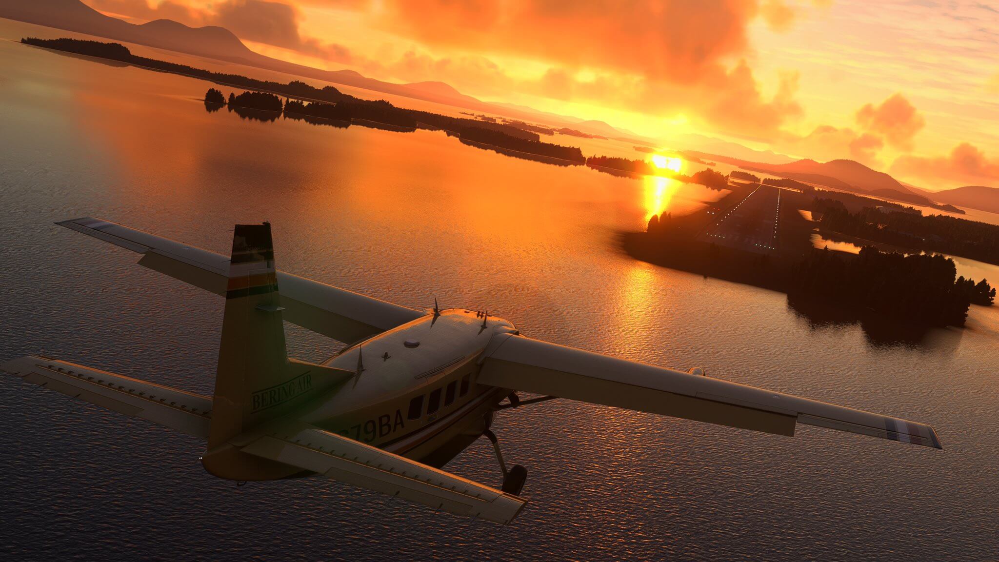 A Cessna Caravan on approach to land with the sun setting in the distance.