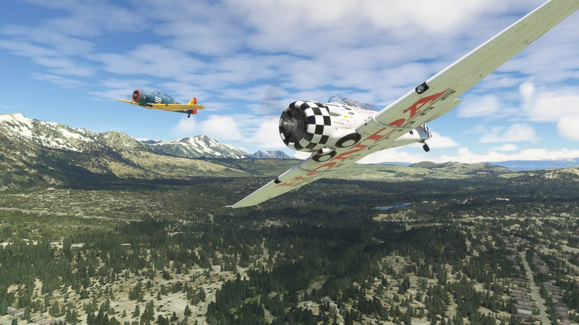 Two Texan T6 aircraft race against one another