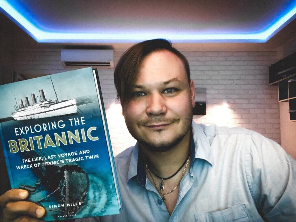 Anton holding a Titanic Book