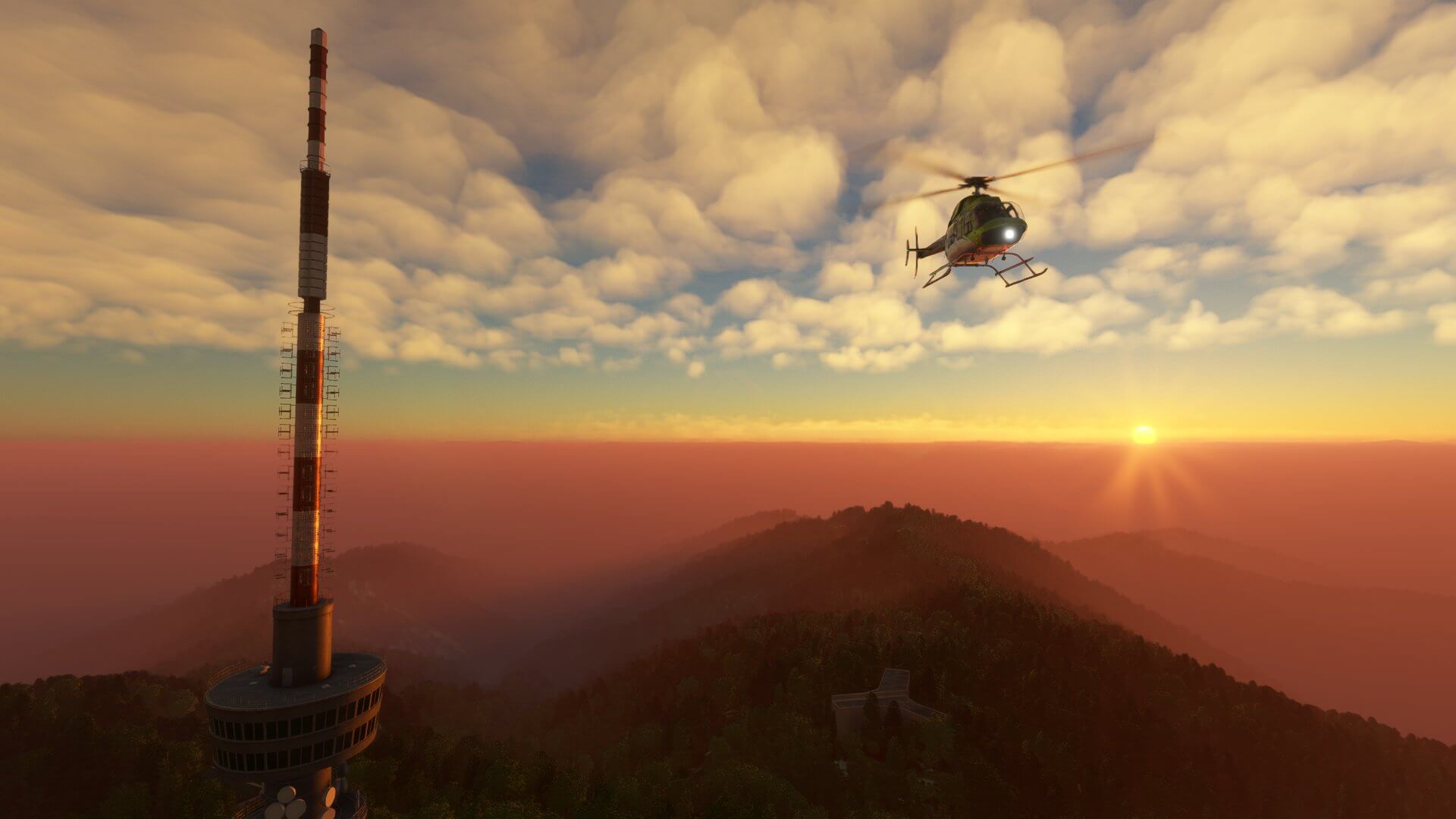 A Bell 407 flies passed high terrain in Zagreb, Croatia during sunset.
