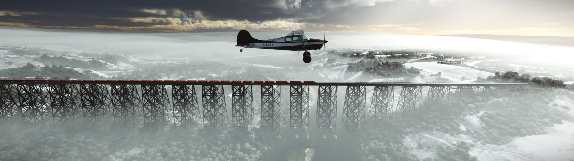 A high-wing Cessna flies parallel with a train on elevated train tracks below.