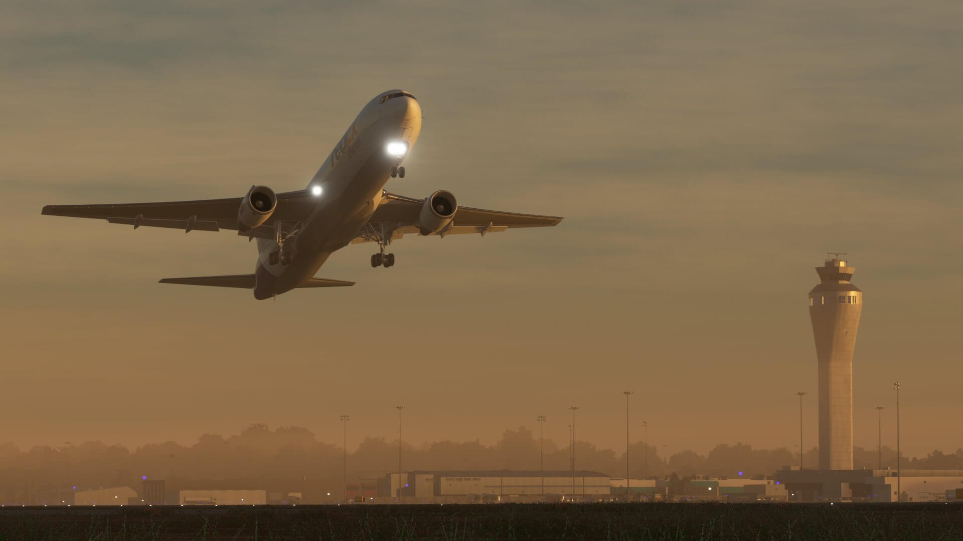 A FedEx Boeing 777 takes off from an international airport hub.