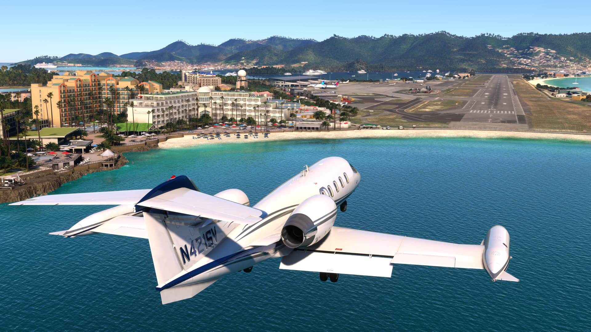 A Learjet on short final to land at Princess Juliana Airport