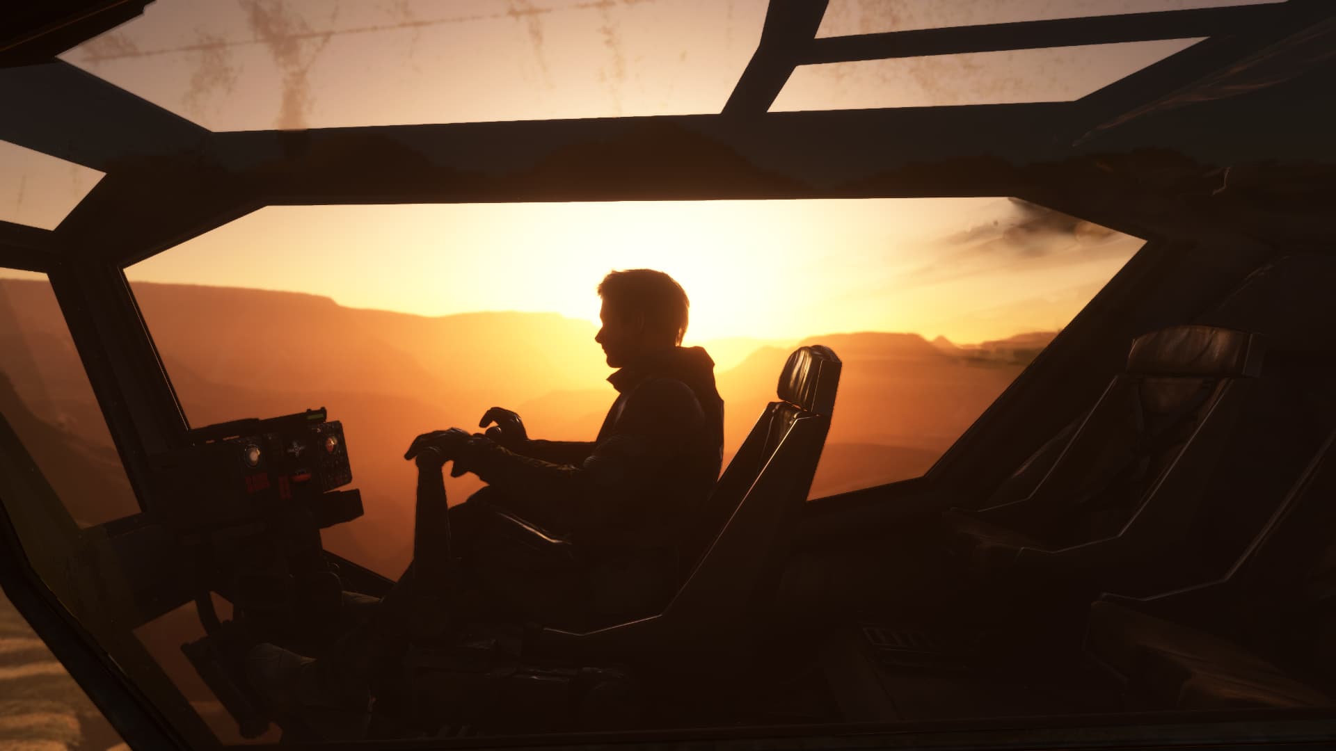 The pilot of the Ornithopter with hands on the controls as the sun sets over the horizon on their right.