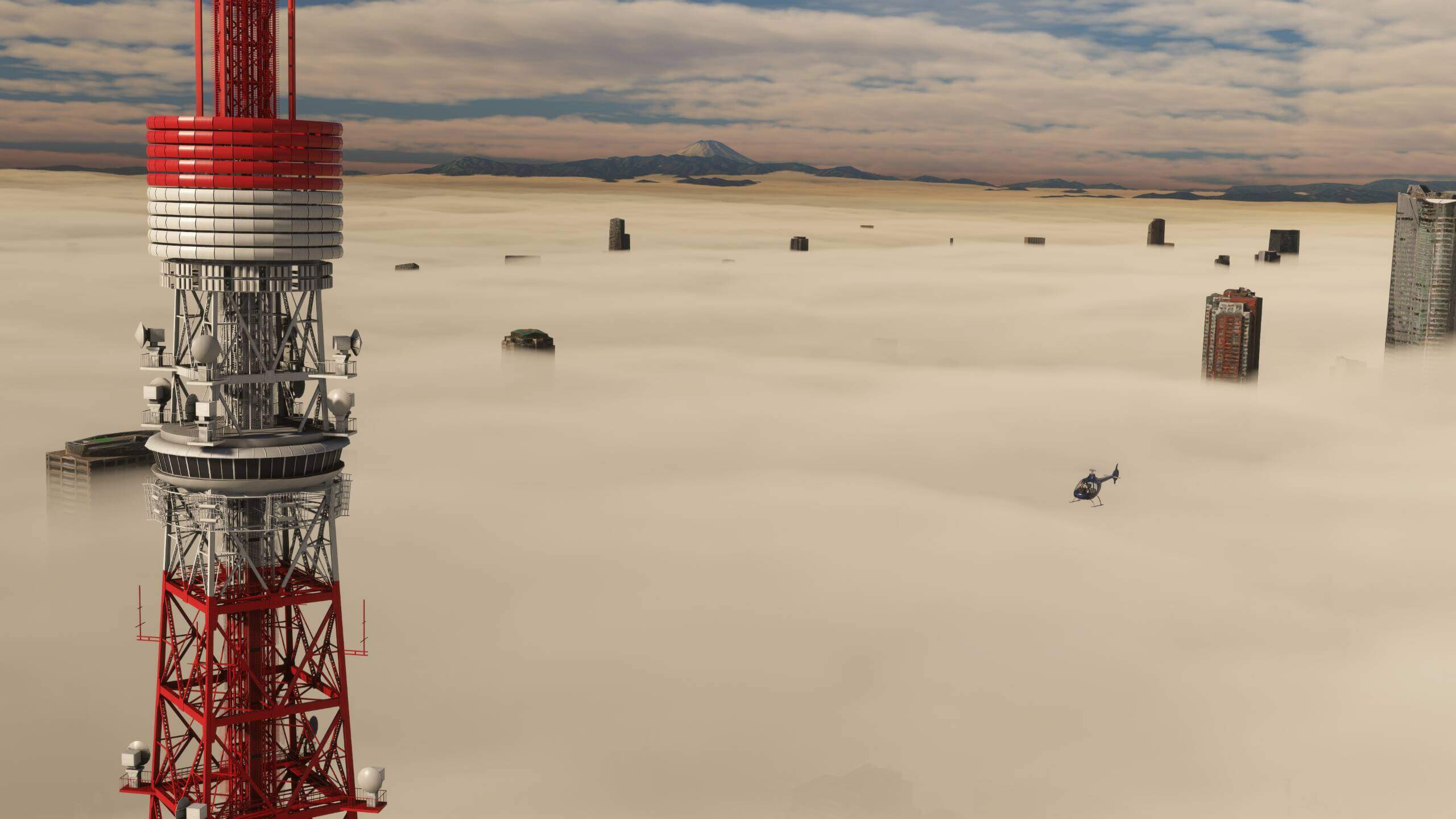 A Cabri G2 helicopter flies above thick overcast clouds, which are covering a cityscape below.