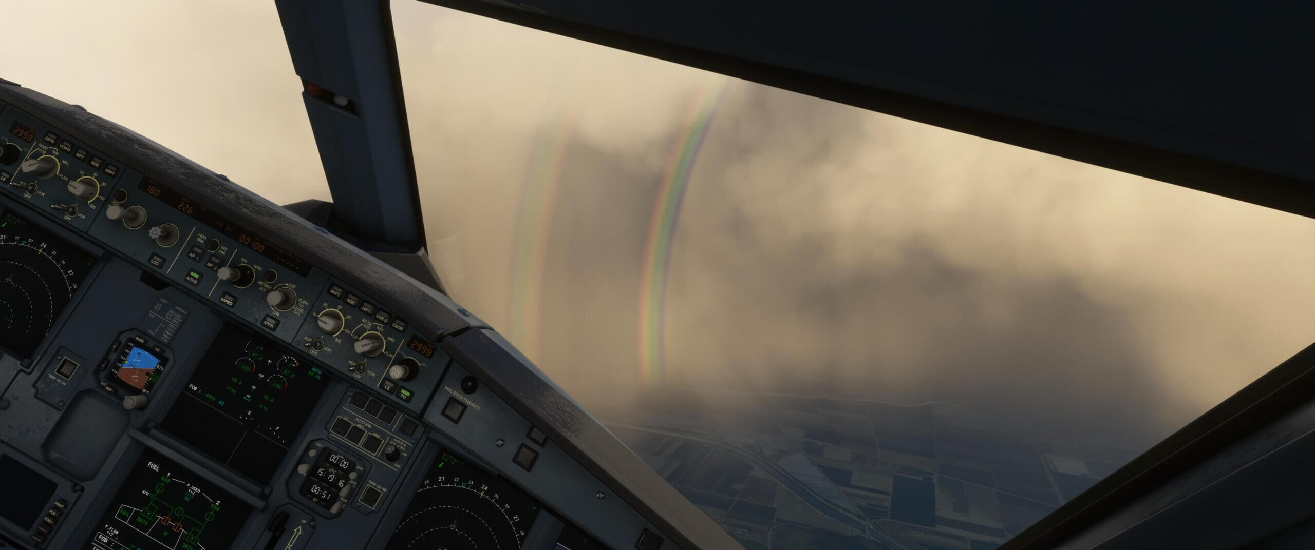An Airbus A320 banks to the right to avoid weather, with two rainbows visible outside of the flight deck windows.