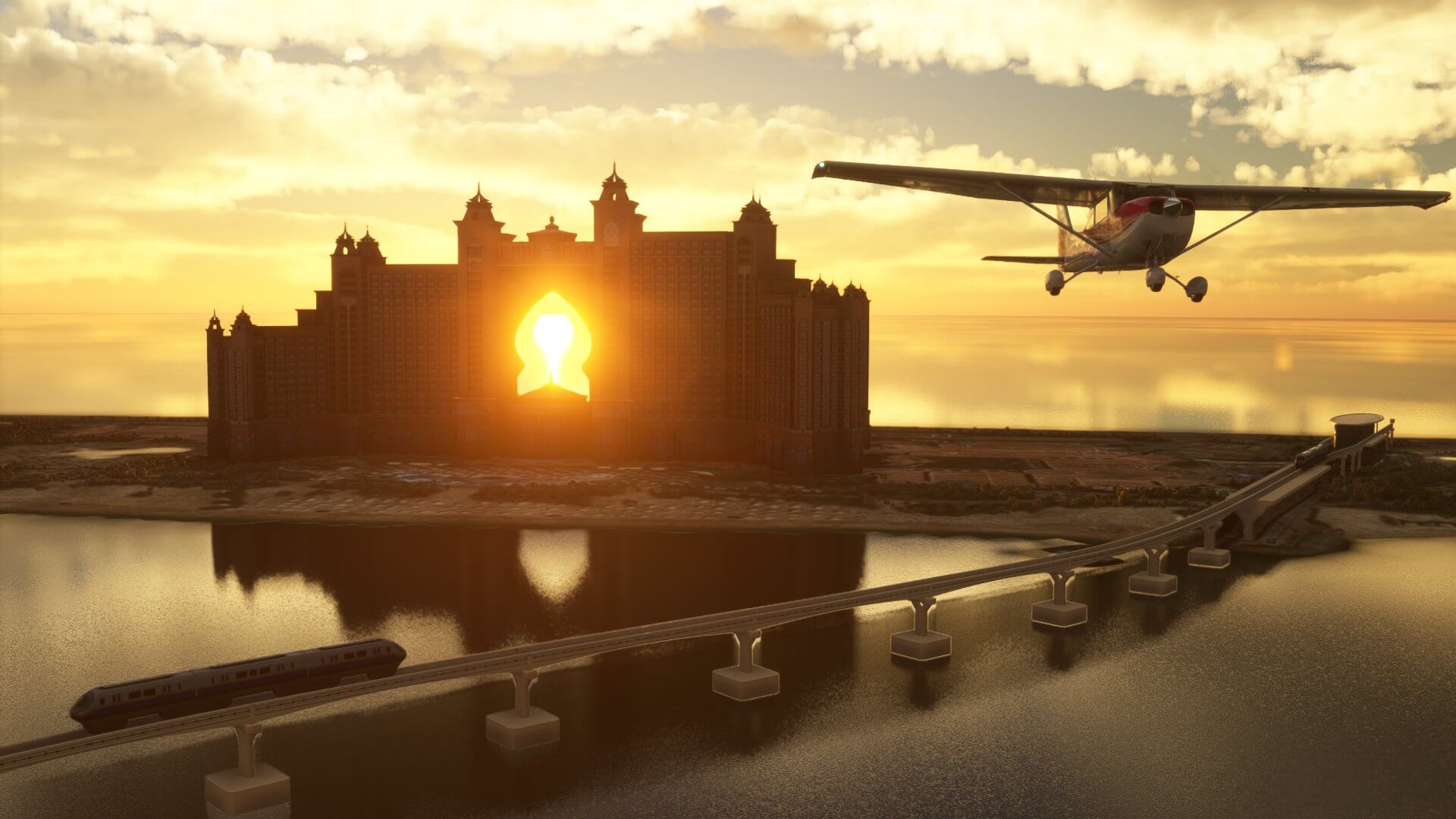 The Cessna 172 flies over a bridge, with the sun visible through a hotel behind.