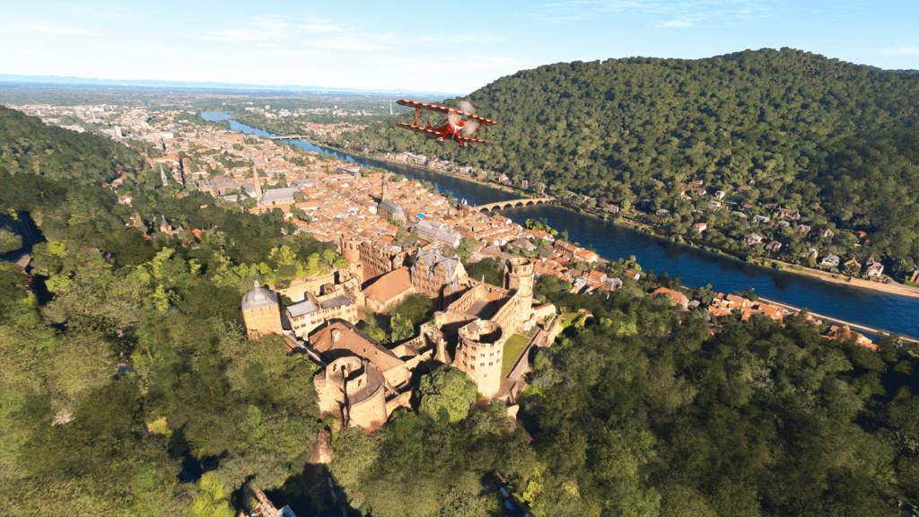 A Pitts Special flies over a German town.