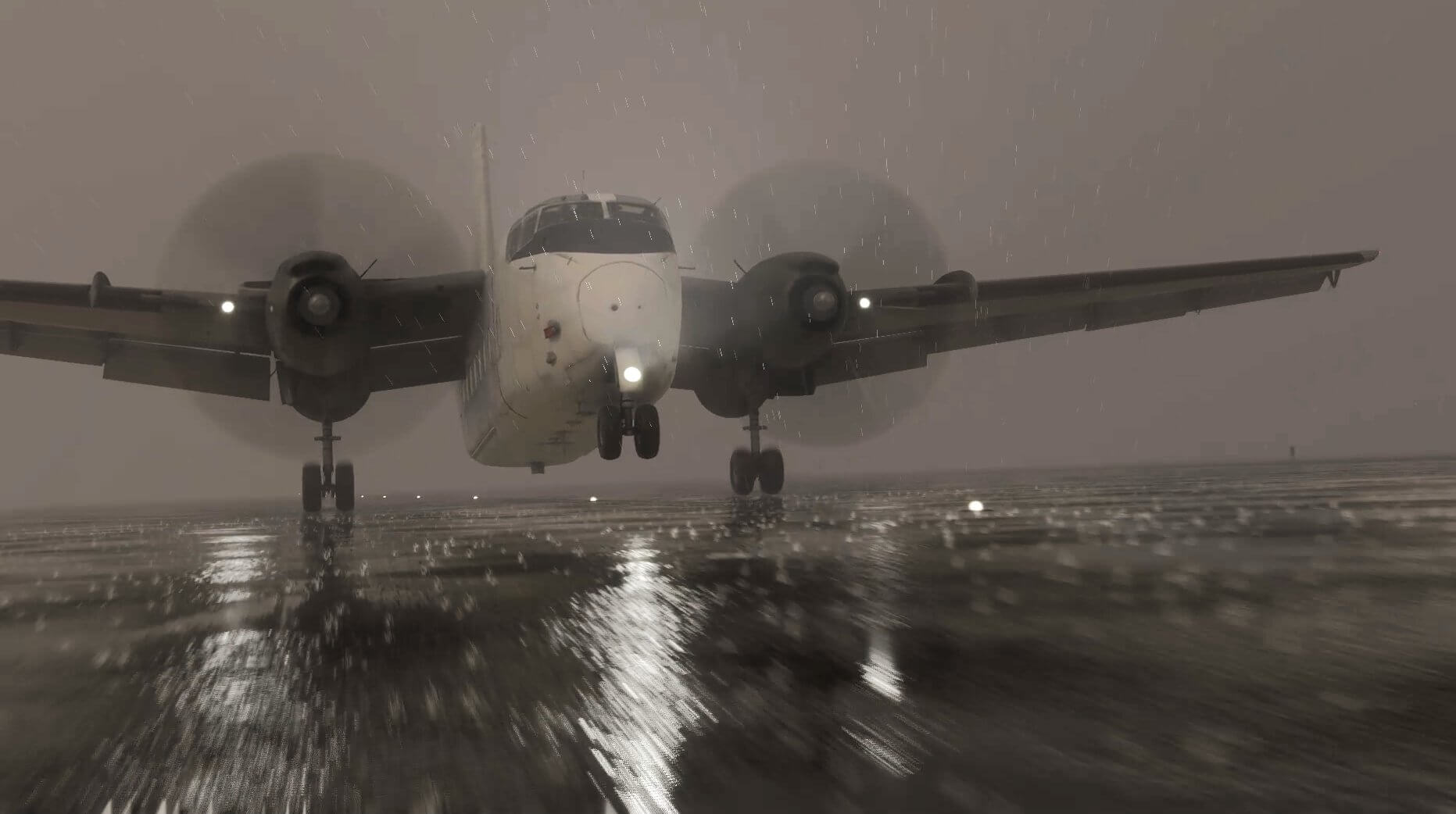 A dual engine turbo-prop aircraft touches down in heavy rain on an extremely wet runway.