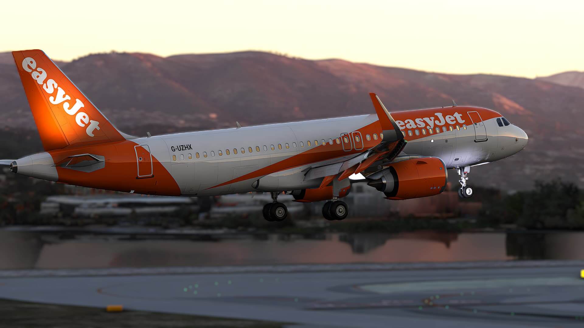 An EasyJet Airbus A320 NEO on short final to land at an airport.