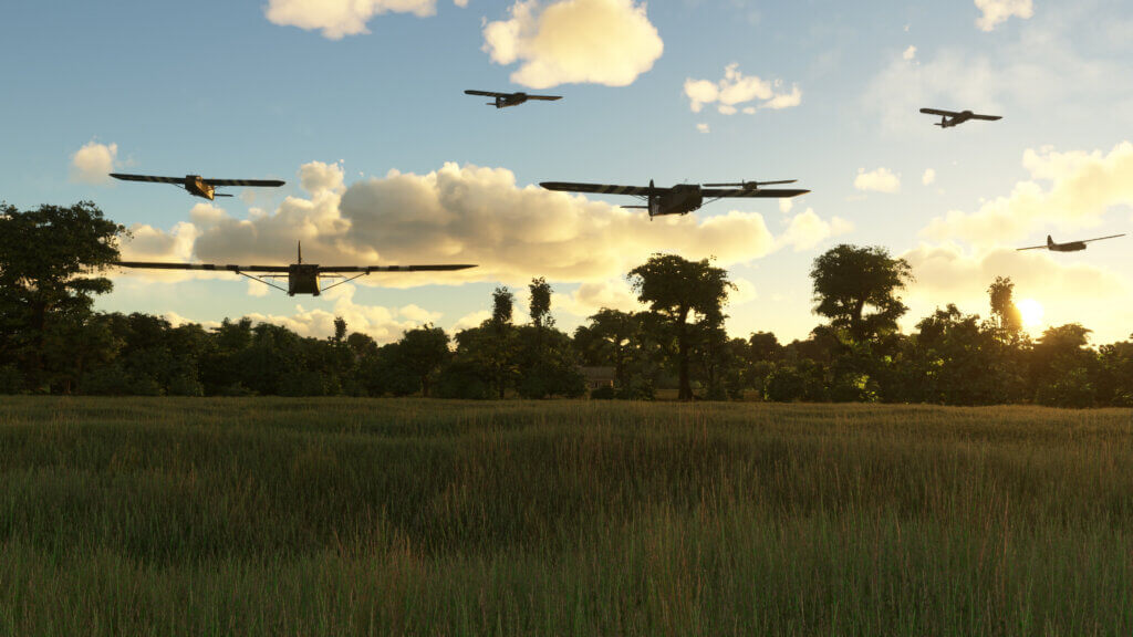 Waco CG-4A gliders coming in for a landing in a field