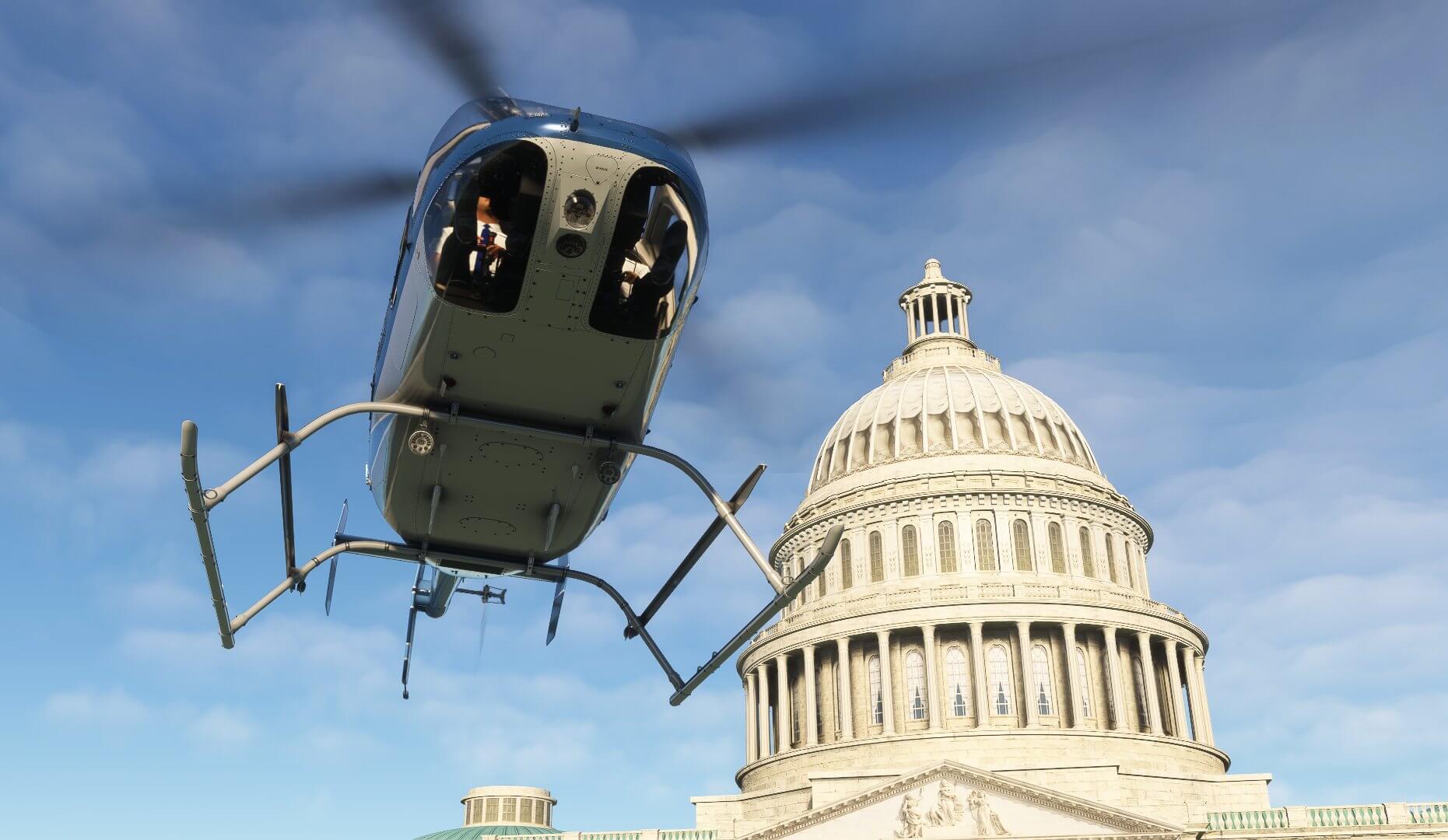 A Bell 407 helicopter hovers next to the Capitol Building, Washington DC