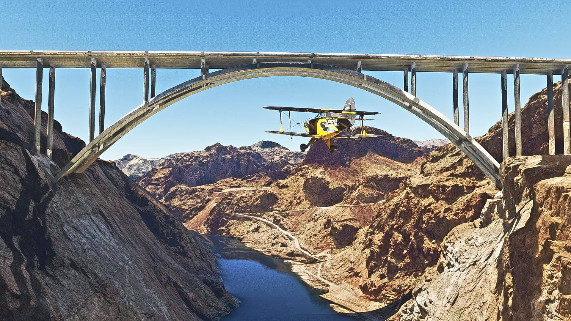 A dual wing propeller aircraft in yellow and black paint passes underneath the bridge across from the Hoover Dam