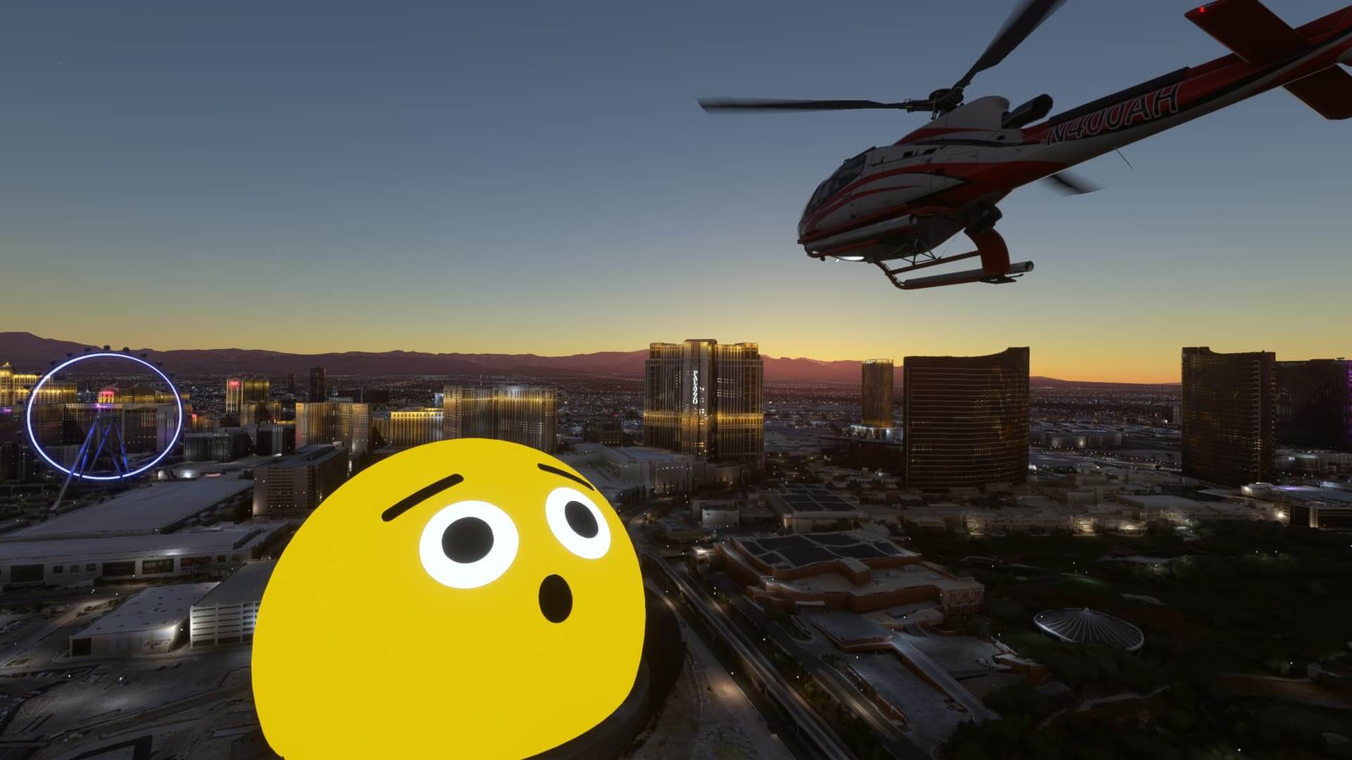 A red and white helicopter passes by the Sphere in Las Vegas with the building lit up as a yellow shocked face