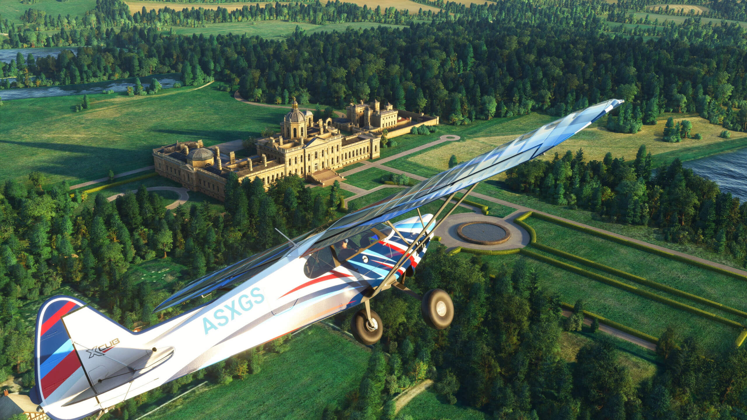 An XCub flies over Castle Howard in England.