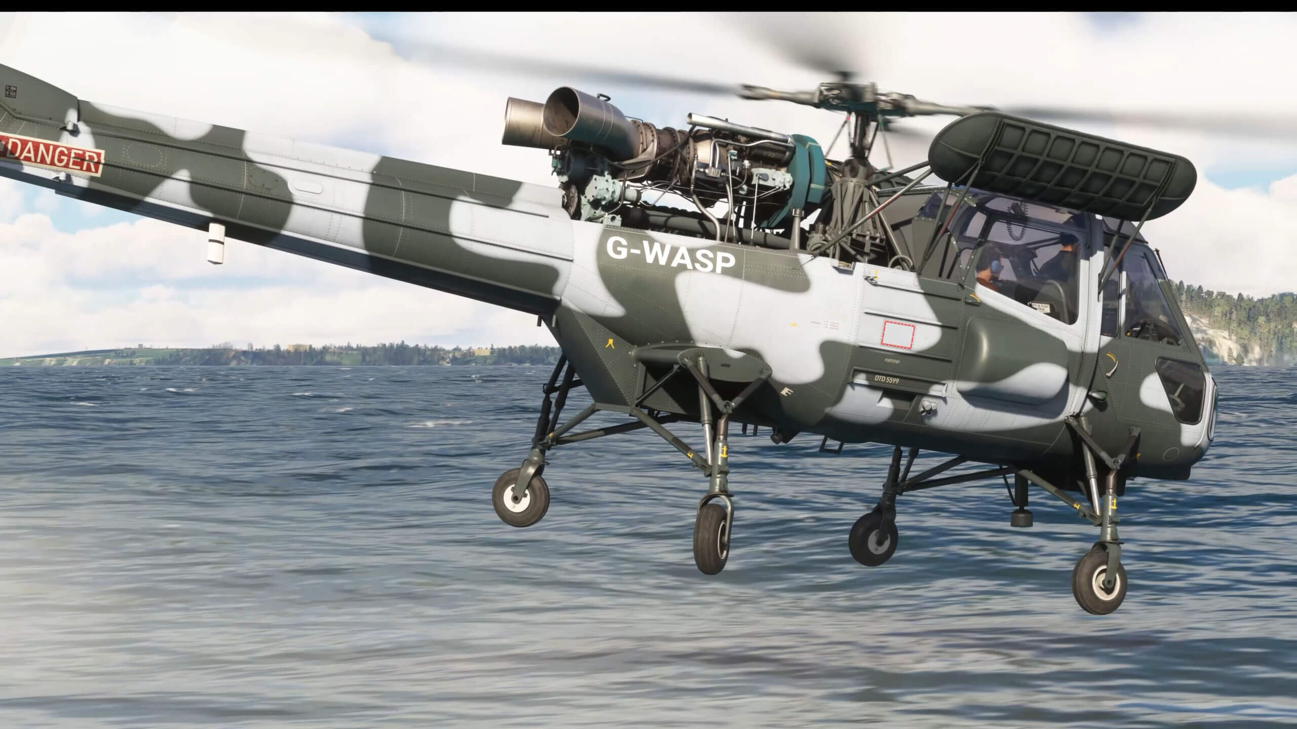 A Westland Wasp flying over water