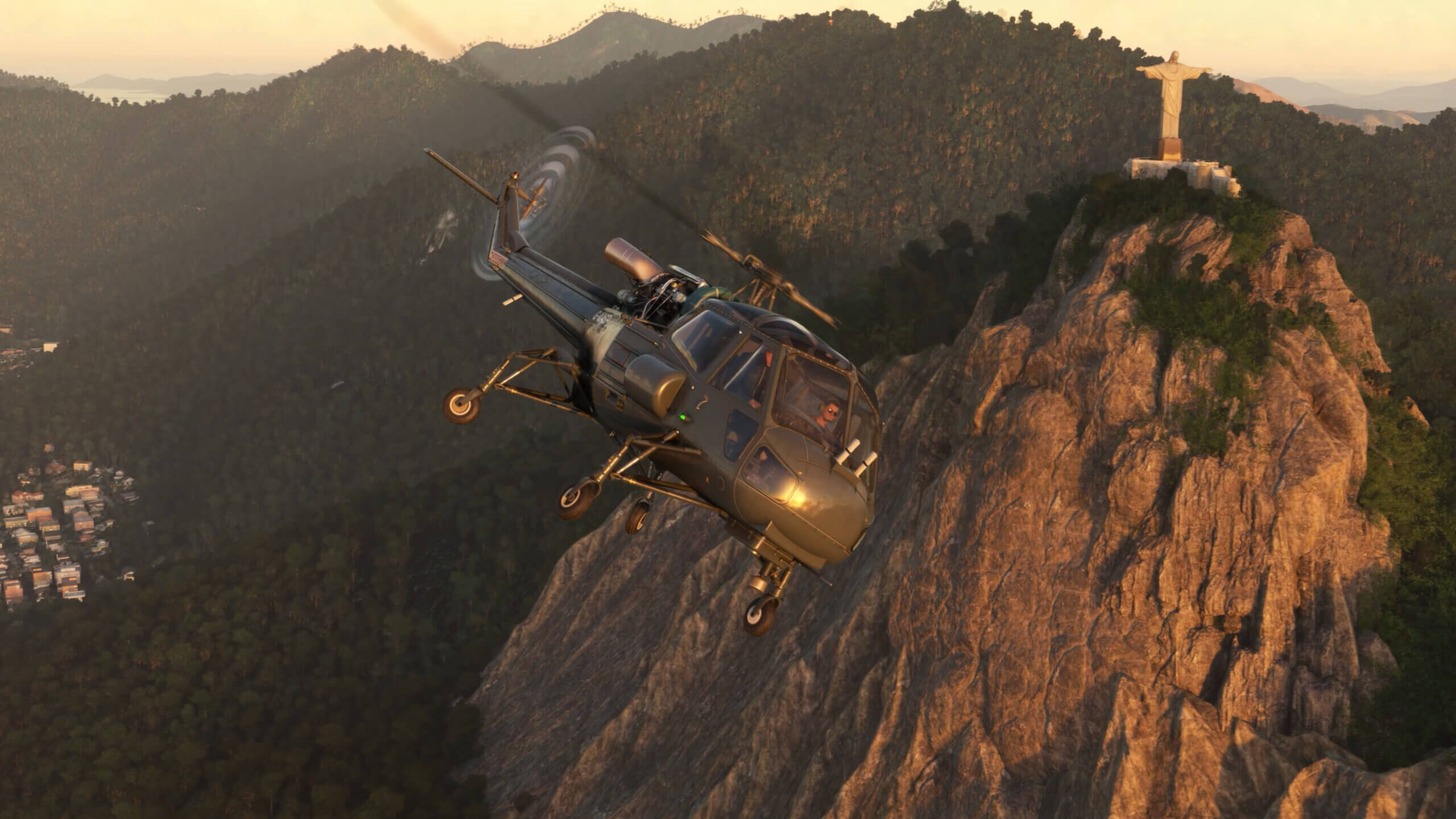 A Westland Wasp banking left whilst flying near Christ the Redeemer, Rio de Janeiro