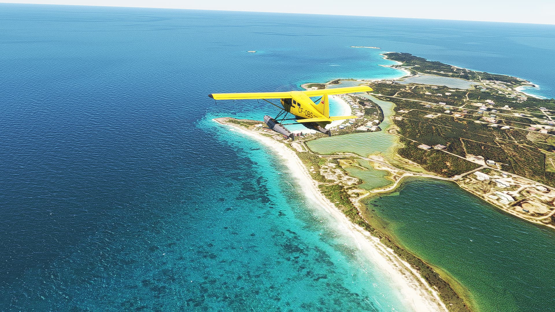 A DHC-2 Beaver flies over an island and blue water.