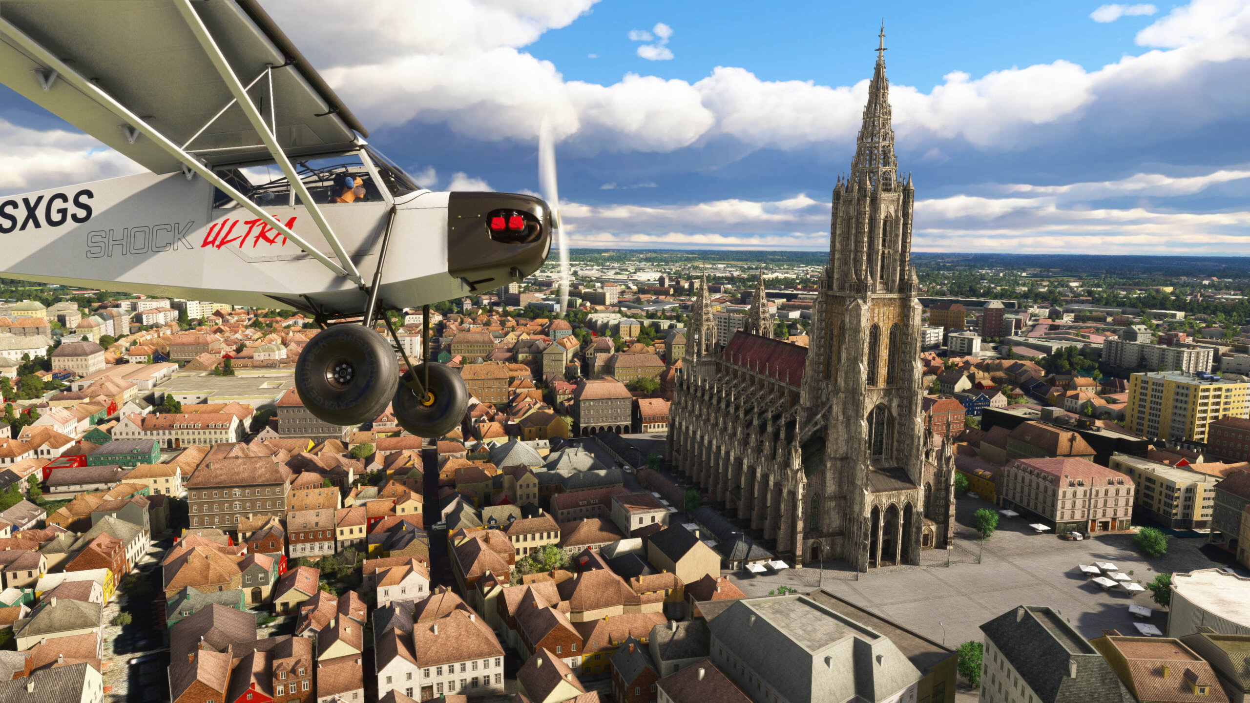 A Shock Ultra flies over a European cathedral