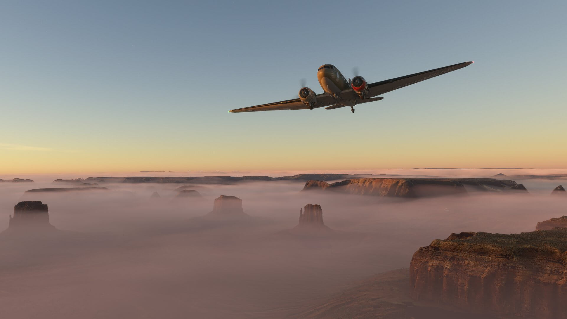 A C-47 Commando passes above a mist covered Arizona Desert