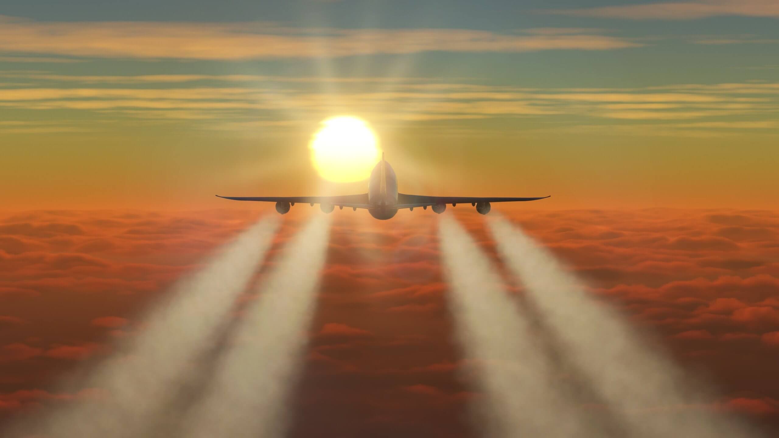 A Boeing 747-8 in cruise over overcast clouds whilst flying towards the sun