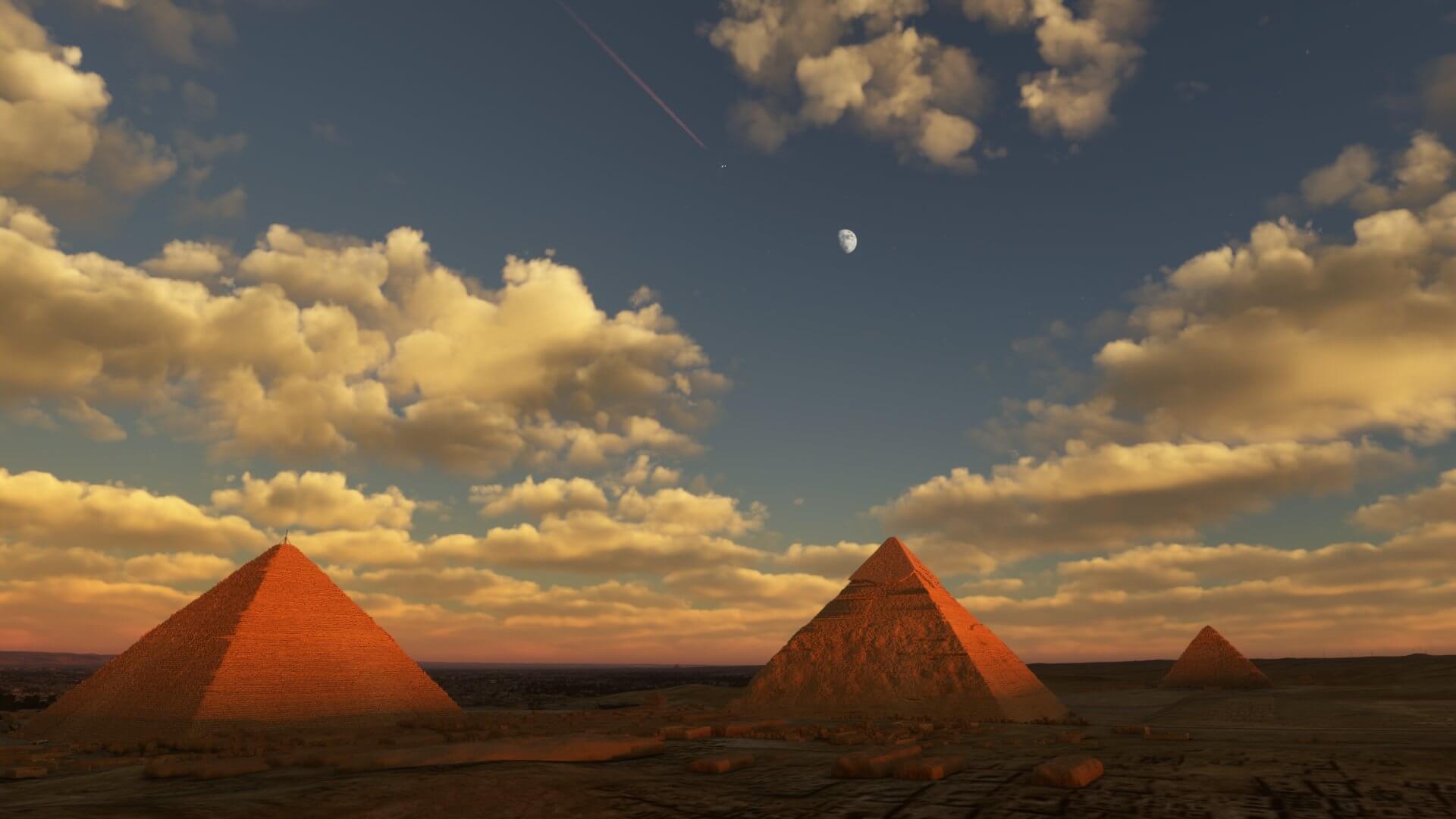 An aircraft contrails are seen high in the sky above the Pyramids in Giza, Egypt