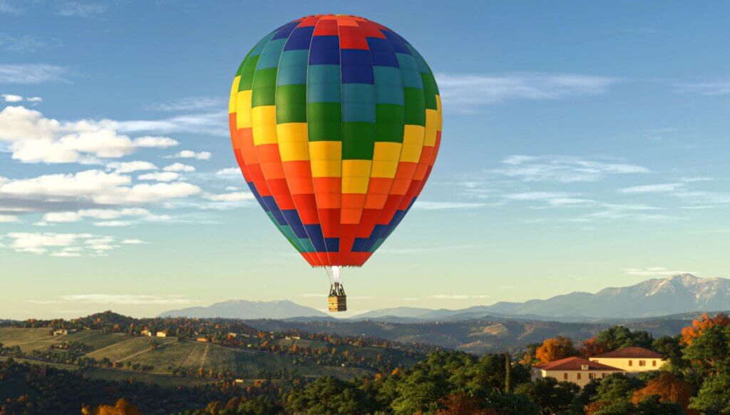 A colorful hot air balloon in flight