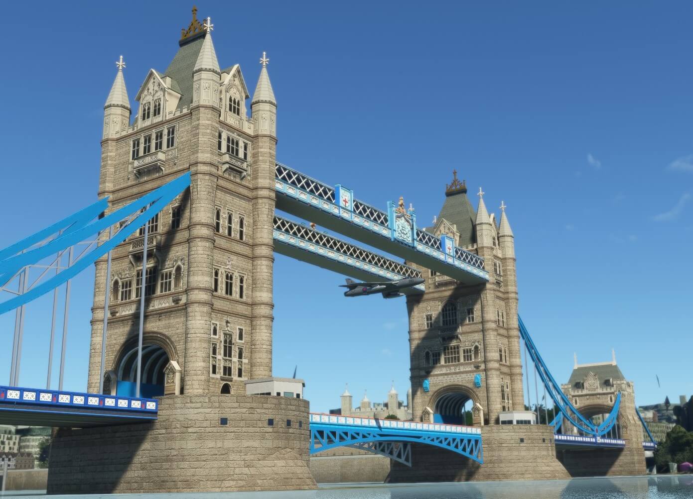 A warbird flies through Tower Bridge, London