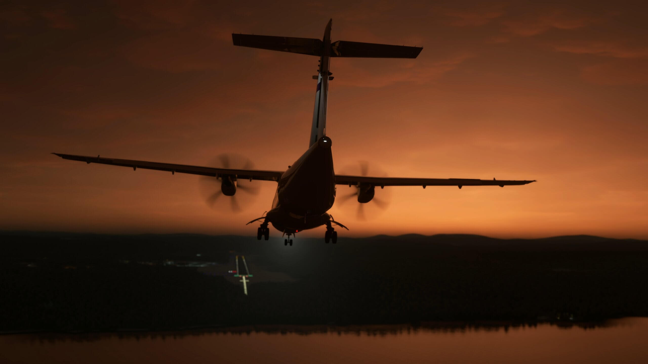 An silhouetted ATR pitches down on approach to land with the runway in sight ahead