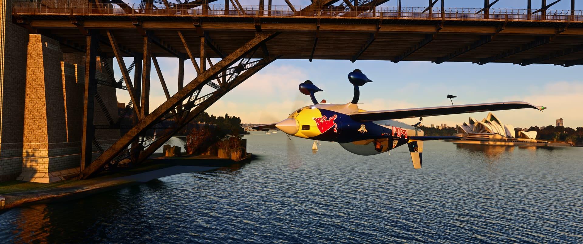 A Red Bull aerobatic aircraft passes under the Sydney Harbour Bridge whilst inverted