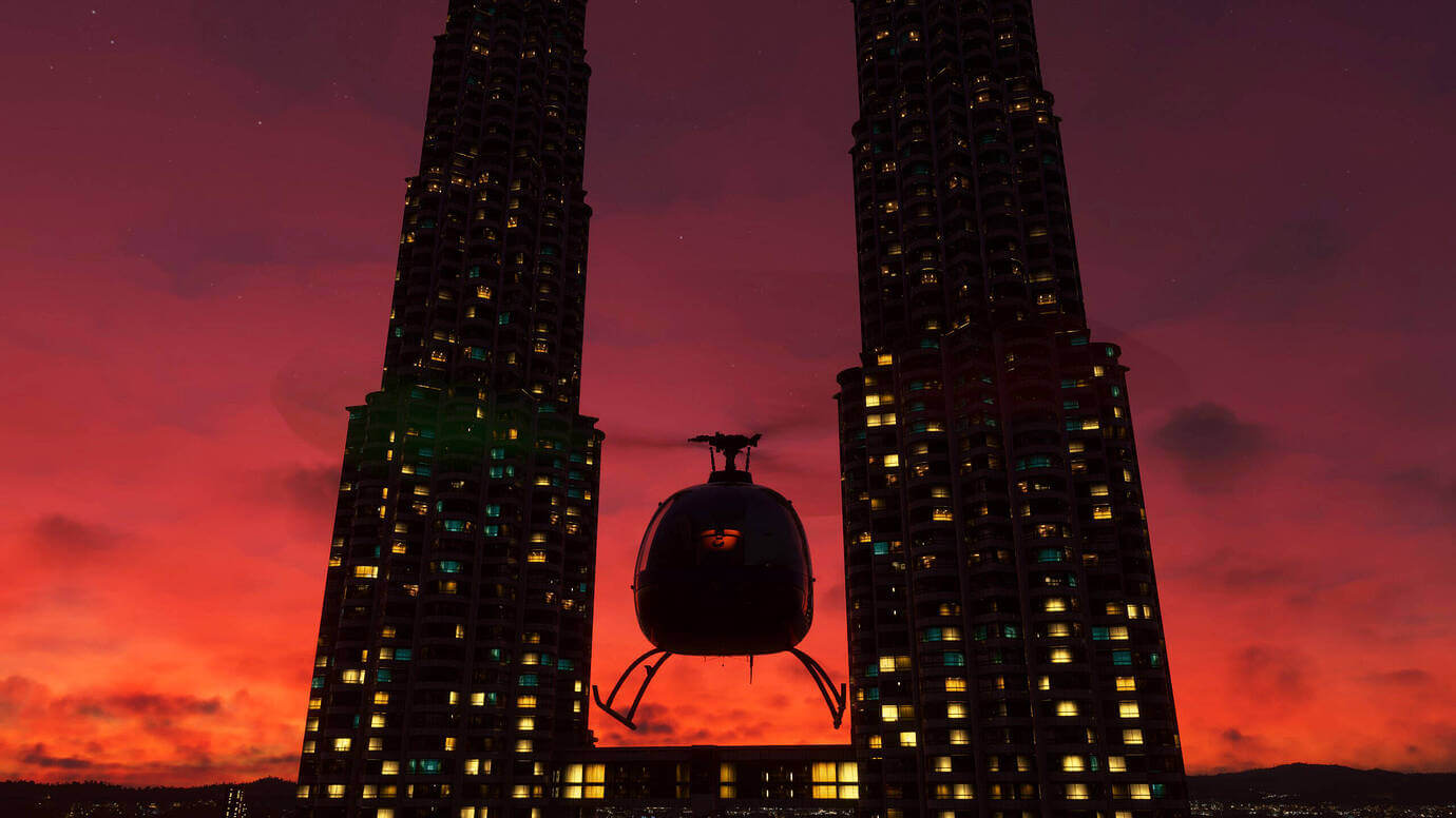 A Helicopter passes through two high rise buildings