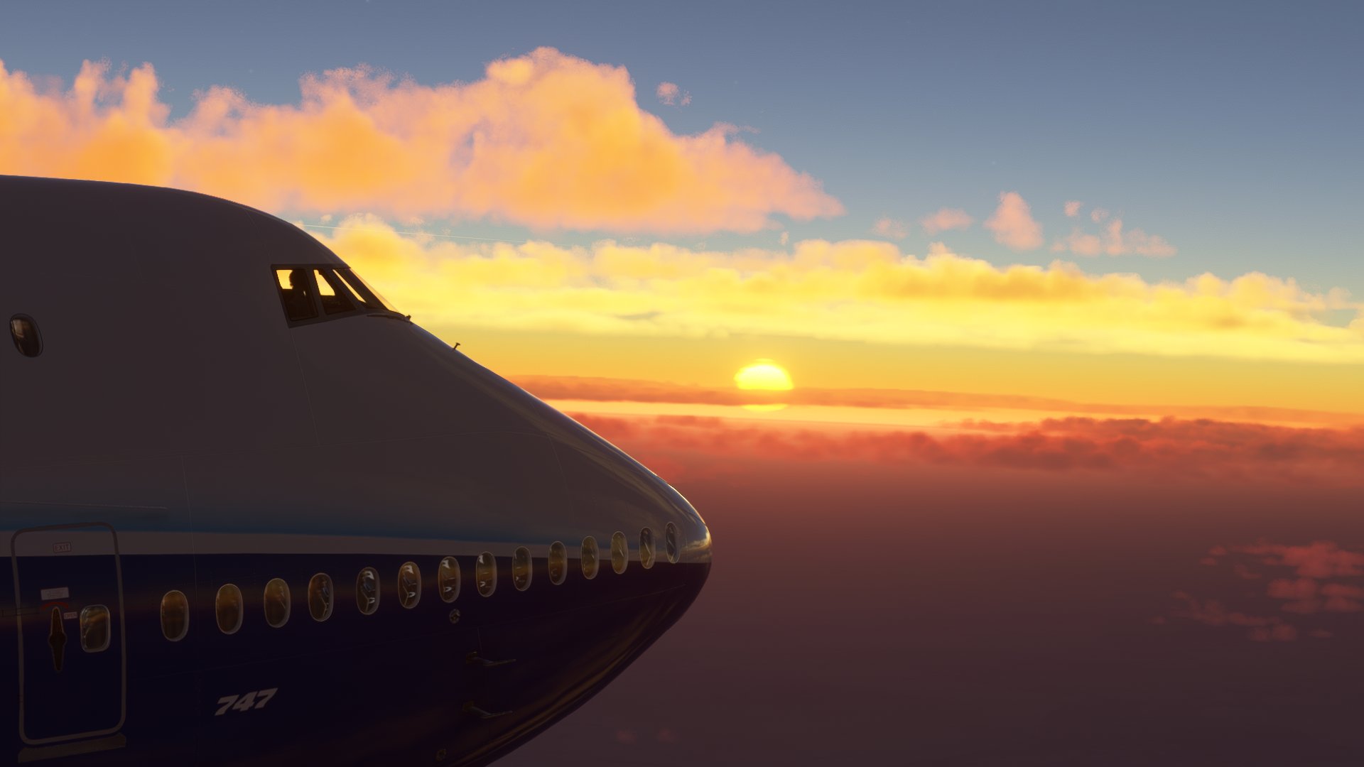 A Boeing 747 at cruise with the sun setting in the distance