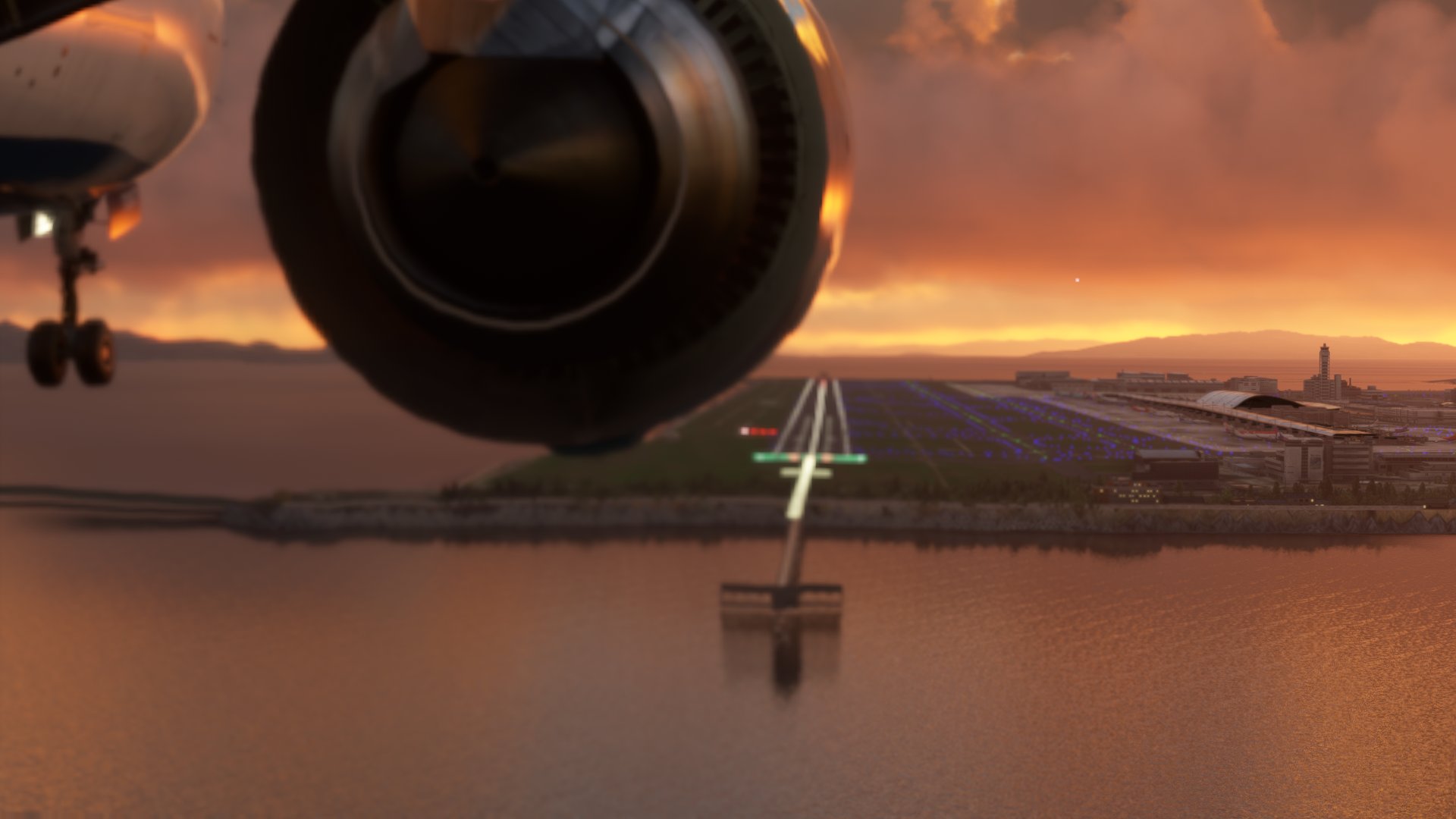 A rear view of an airliner's jet engine with the plane on short final.