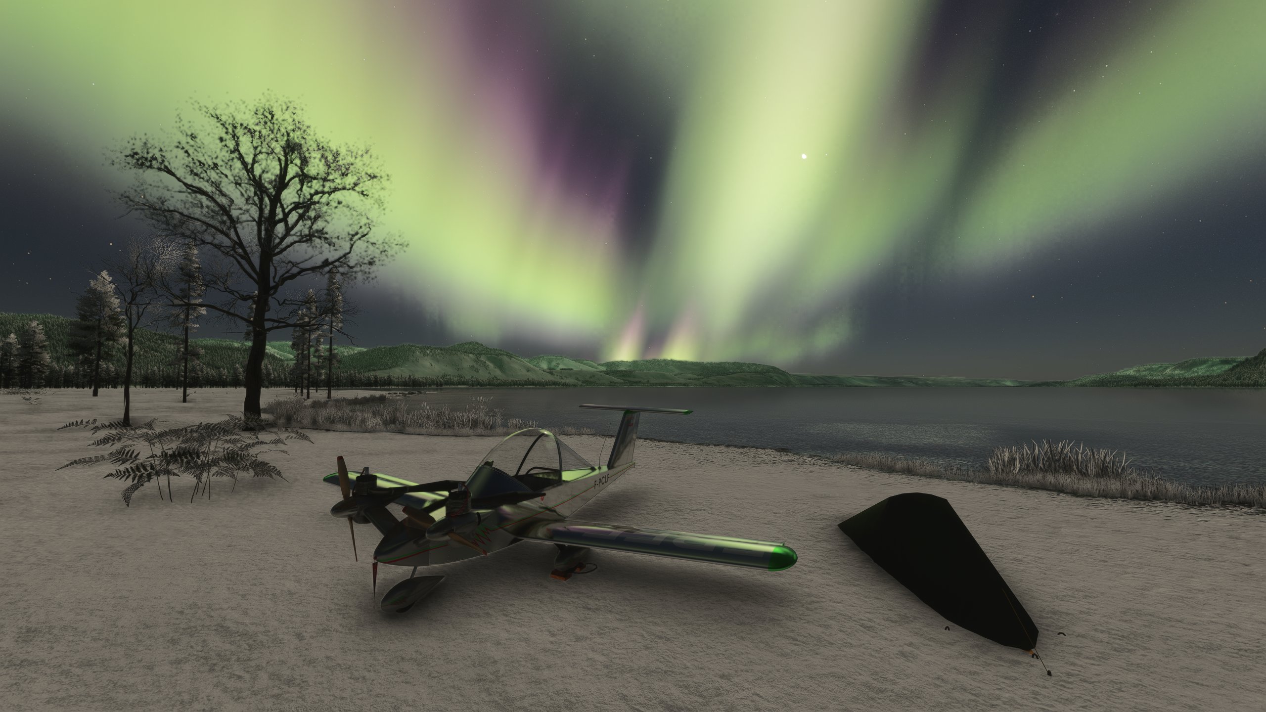 A propeller aircraft parked next to a camping tent with the Aurora Borealis in the sky above